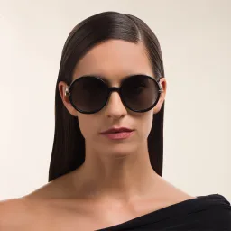 Shop JIMMY CHOO Oversized Round Sunglasses in Black online.
