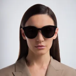 Shop GUCCI Cat Eye Sunglasses in Black online.