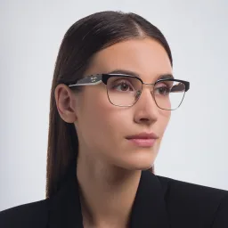 Shop PRADA Irregular Eyeglasses in Black/Pale Gold online.