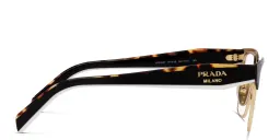 Shop PRADA Irregular Eyeglasses in Black/Pale Gold online.