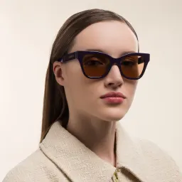 Shop GUCCI Cat Eye Sunglasses in Purple online.