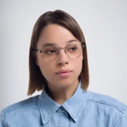 Shop SAINT LAURENT Unisex Round Eyeglasses in Silver online.