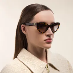 Shop MIU MIU Cat-Eye Sunglasses in Honey Havana online.