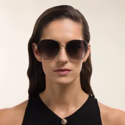 Shop GUCCI Oversized Irregular Sunglasses in Gold online.
