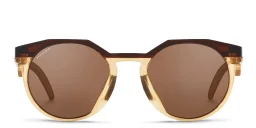 Shop Oakley HSTN Round Sunglasses in Brown online.