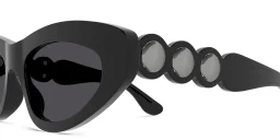 Shop ALAIA Scalloped Cat-Eye Sunglasses in Black online.
