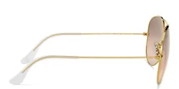 Shop Ray-Ban Unisex Aviator Sunglasses in Metal in Polished Arista Gold online.