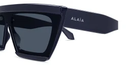 Shop ALAIA The Cut Wide Irregular Sunglasses in Blue online.