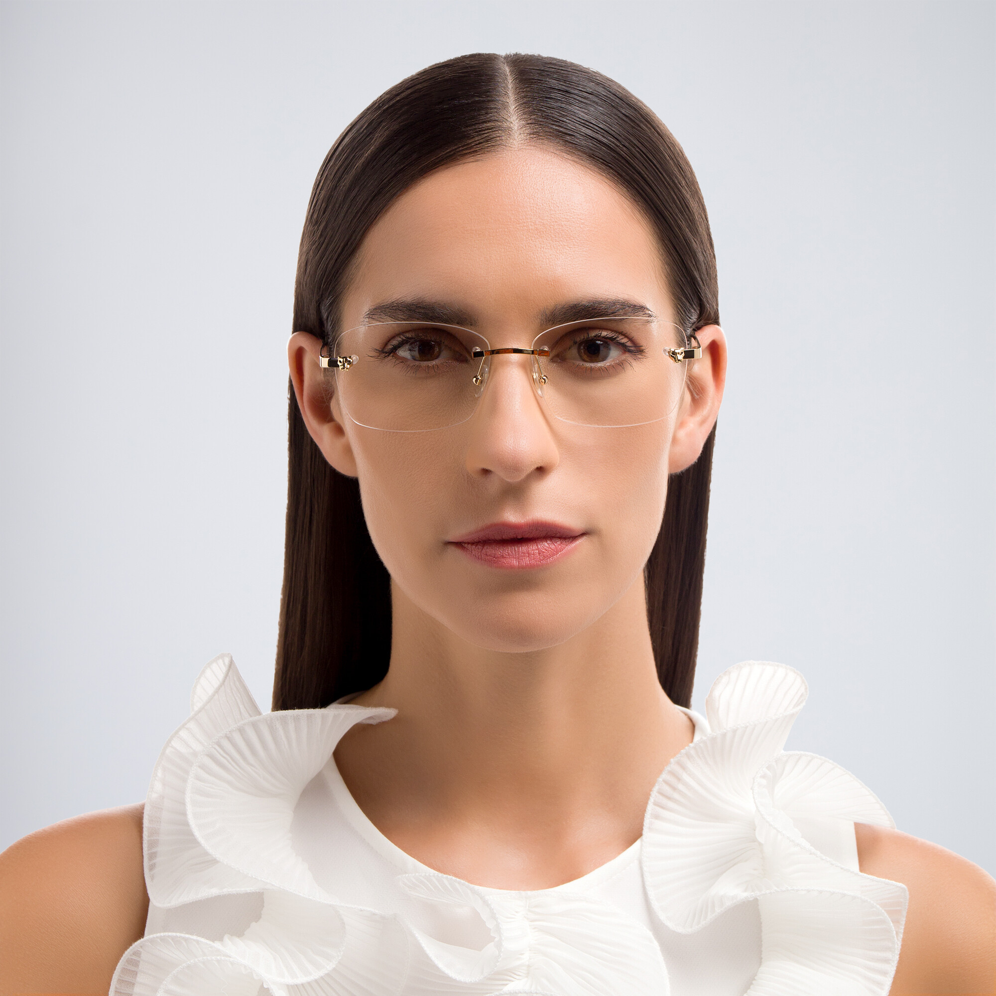 Shop Cartier Panthère de Cartier Rimless Wide Eyeglasses in Gold online.