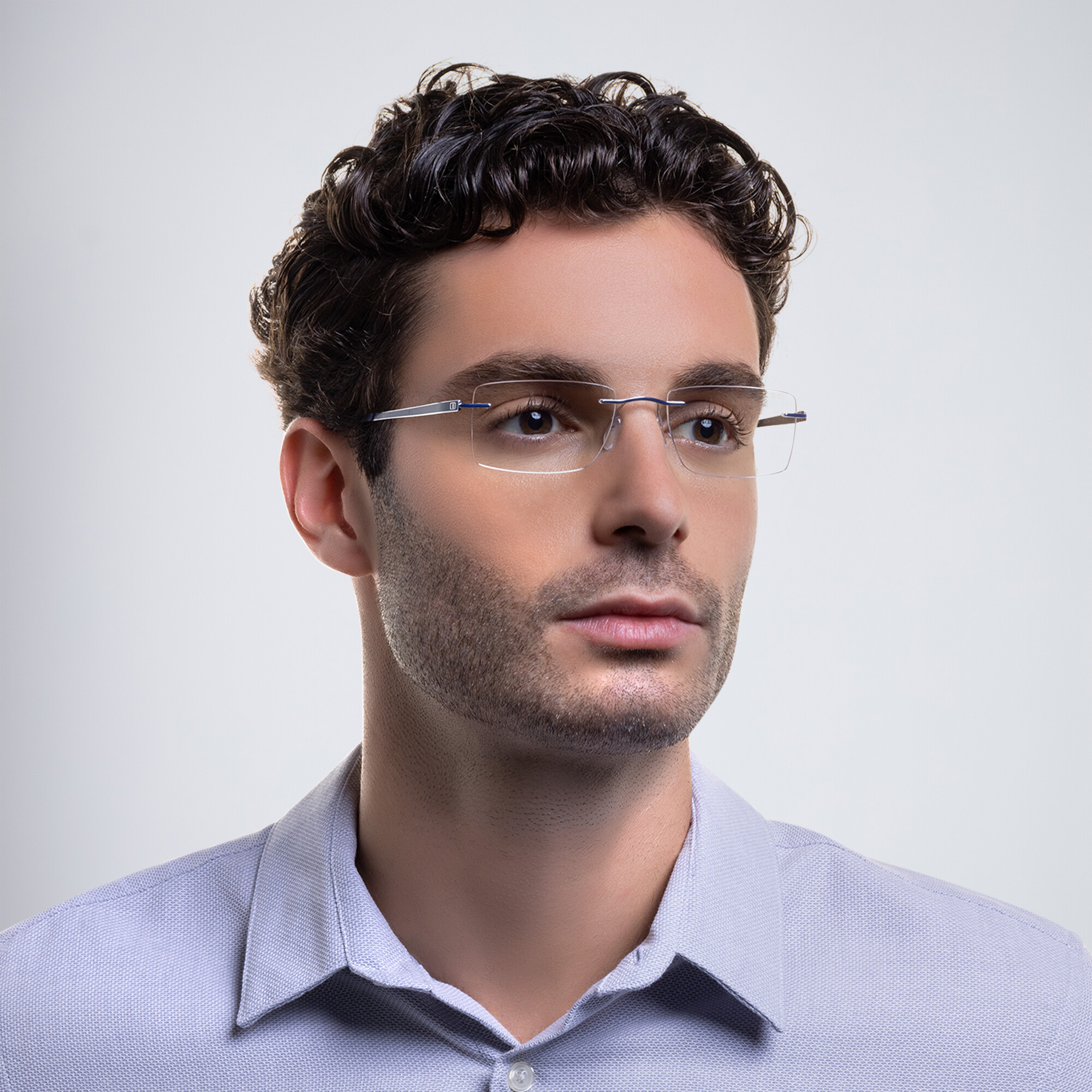 Shop Silhouette Rimless Rectangle Eyeglasses in Silver online.