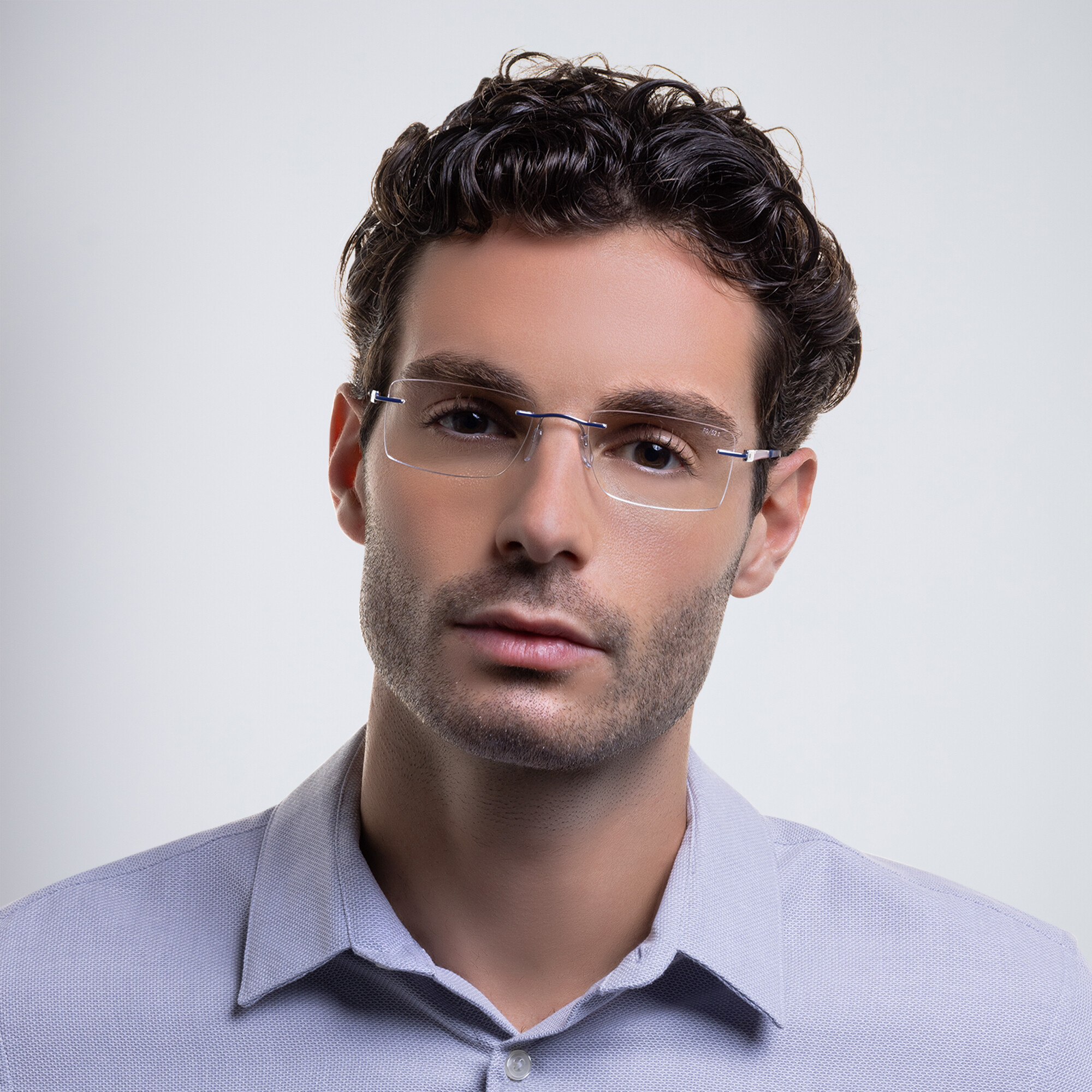 Shop Silhouette Rimless Rectangle Eyeglasses in Silver online.