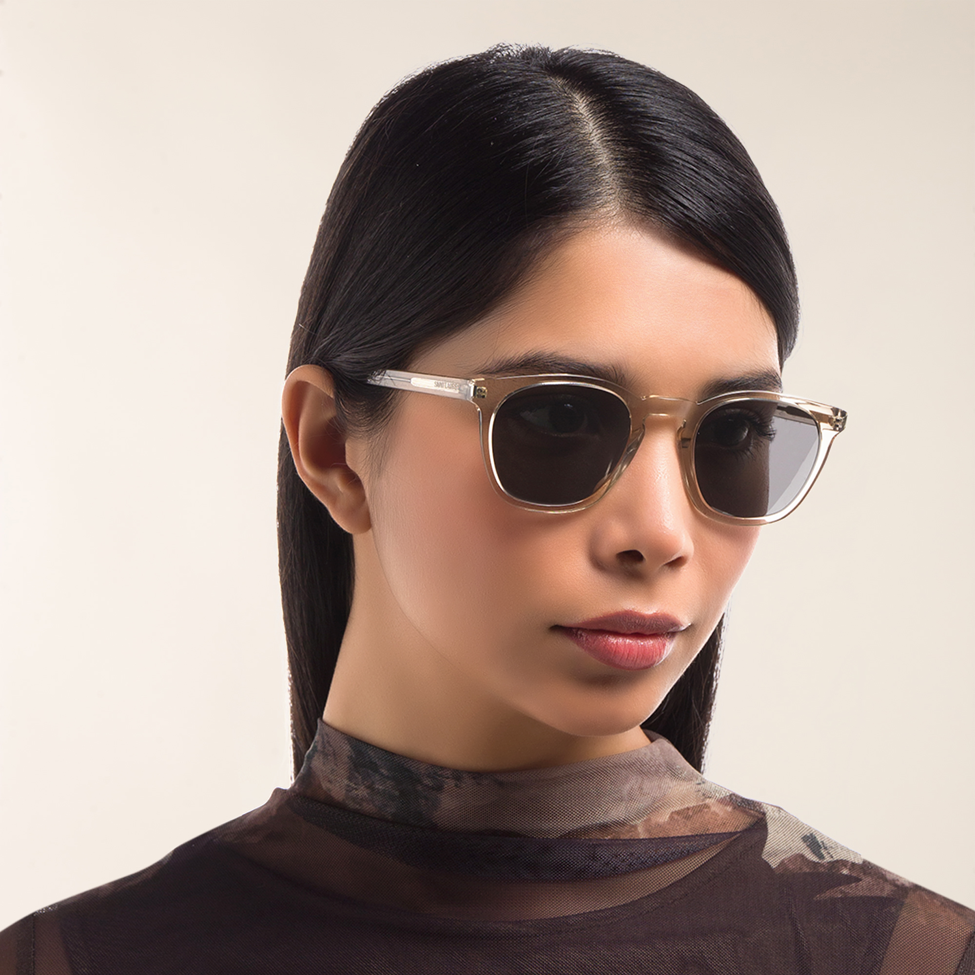 Shop SAINT LAURENT Unisex Round Sunglasses in Beige online.