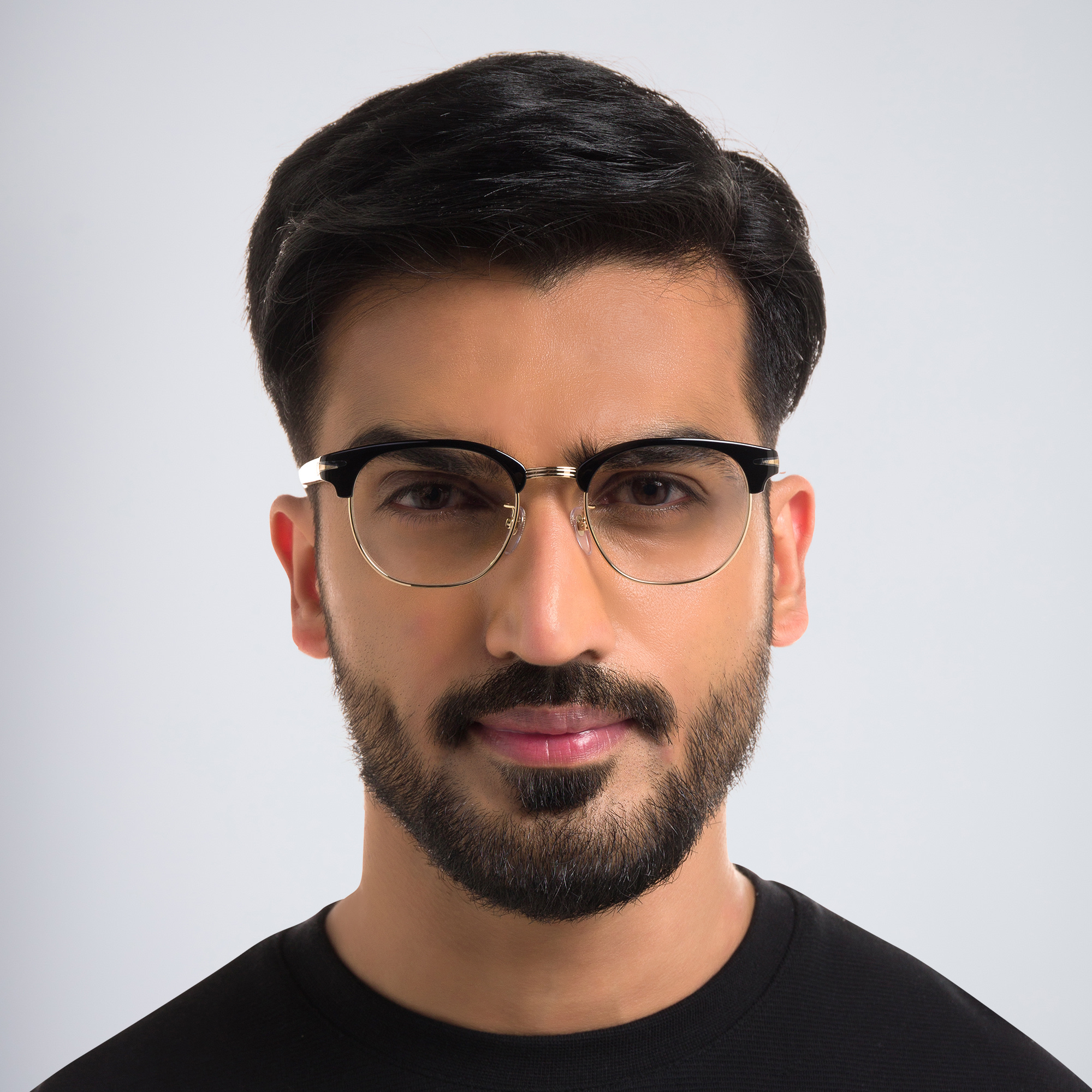 Shop DAVID BECKHAM Round Eyeglasses in Black online.