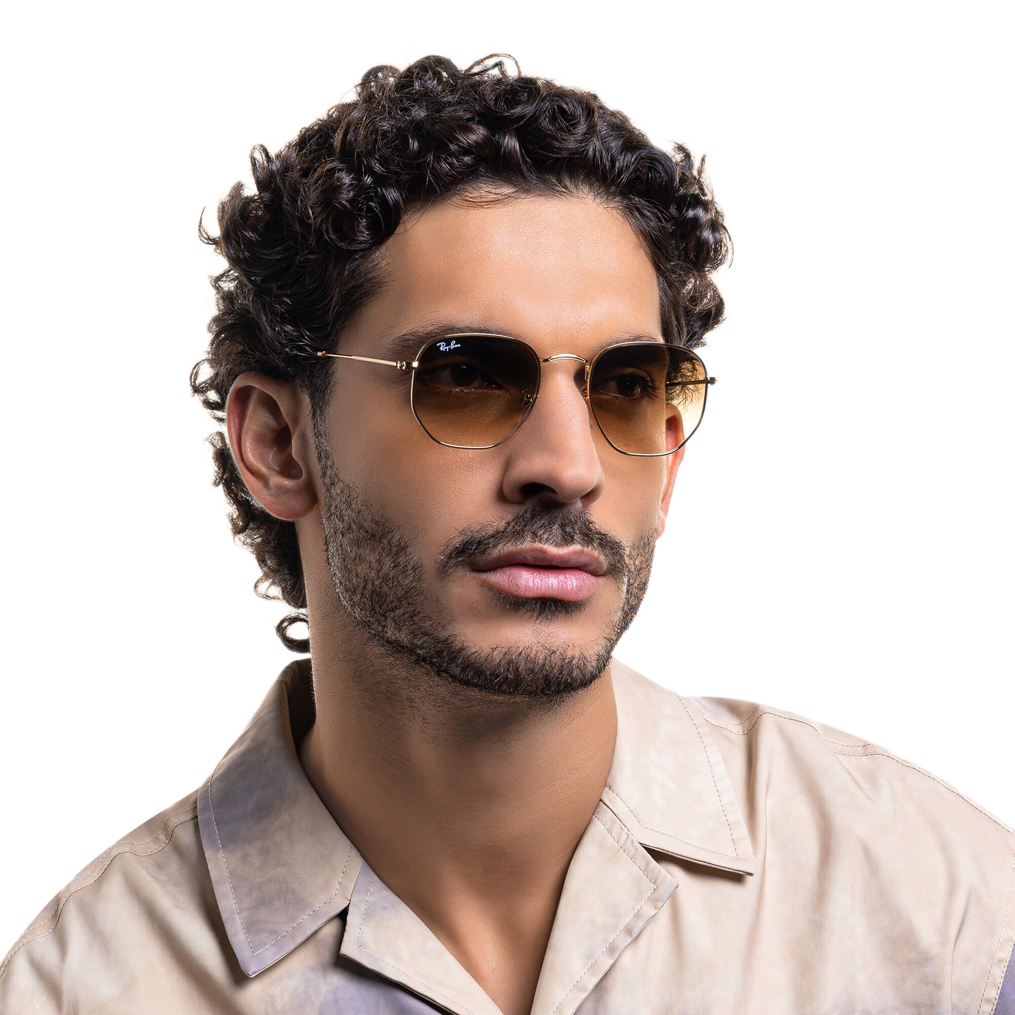 Shop Ray-Ban Hexagonal Unisex Sunglasses in Shiny Gold online.