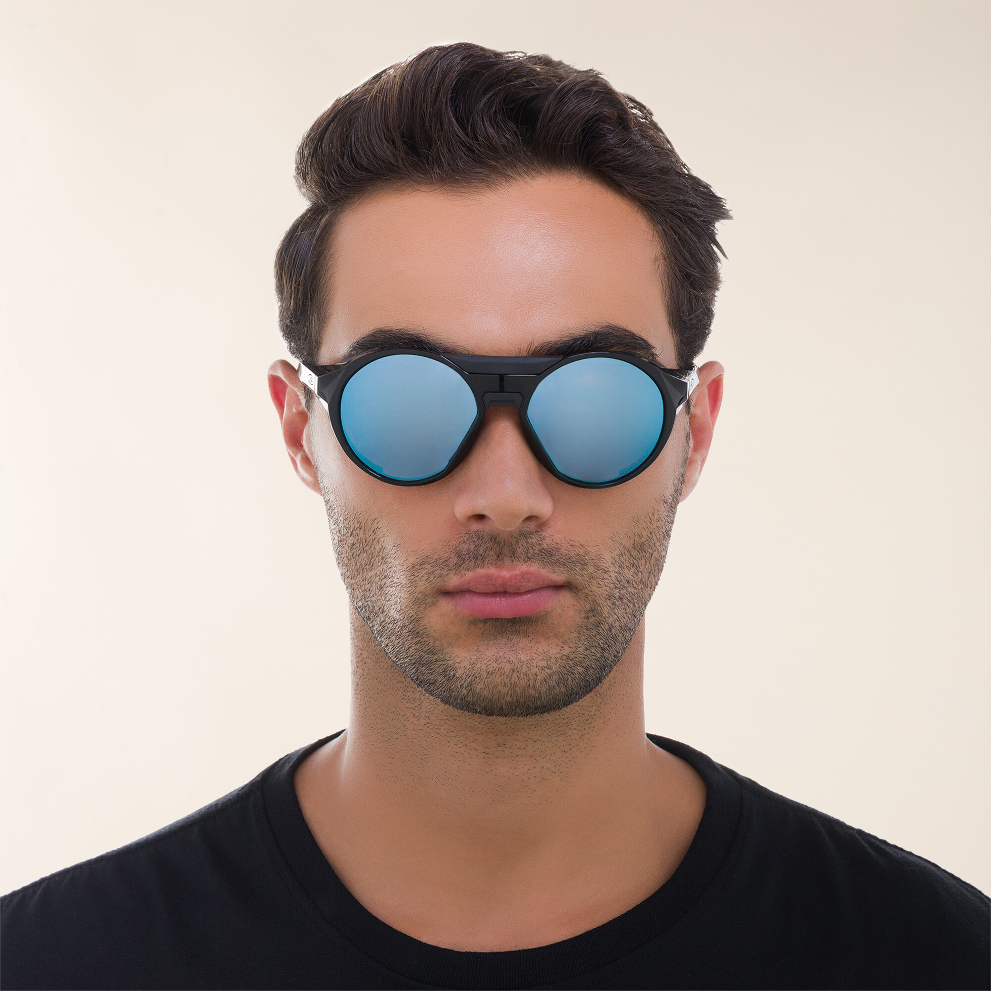 Shop Oakley Clifden Round Sunglasses in Polished Black online.