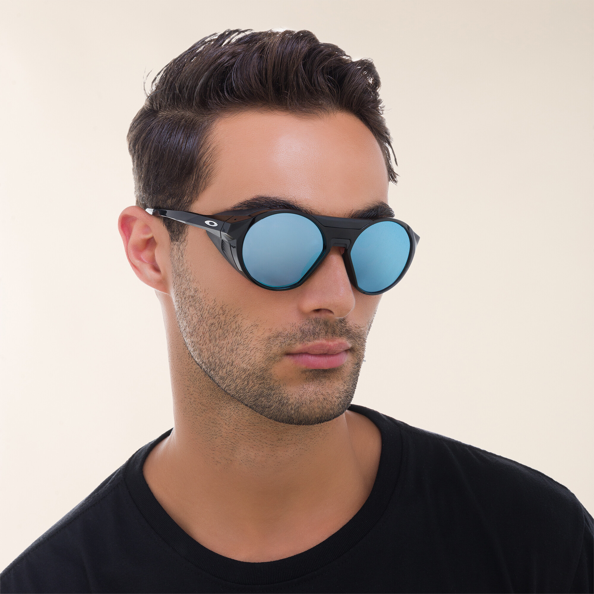 Shop Oakley Clifden Round Sunglasses in Polished Black online.