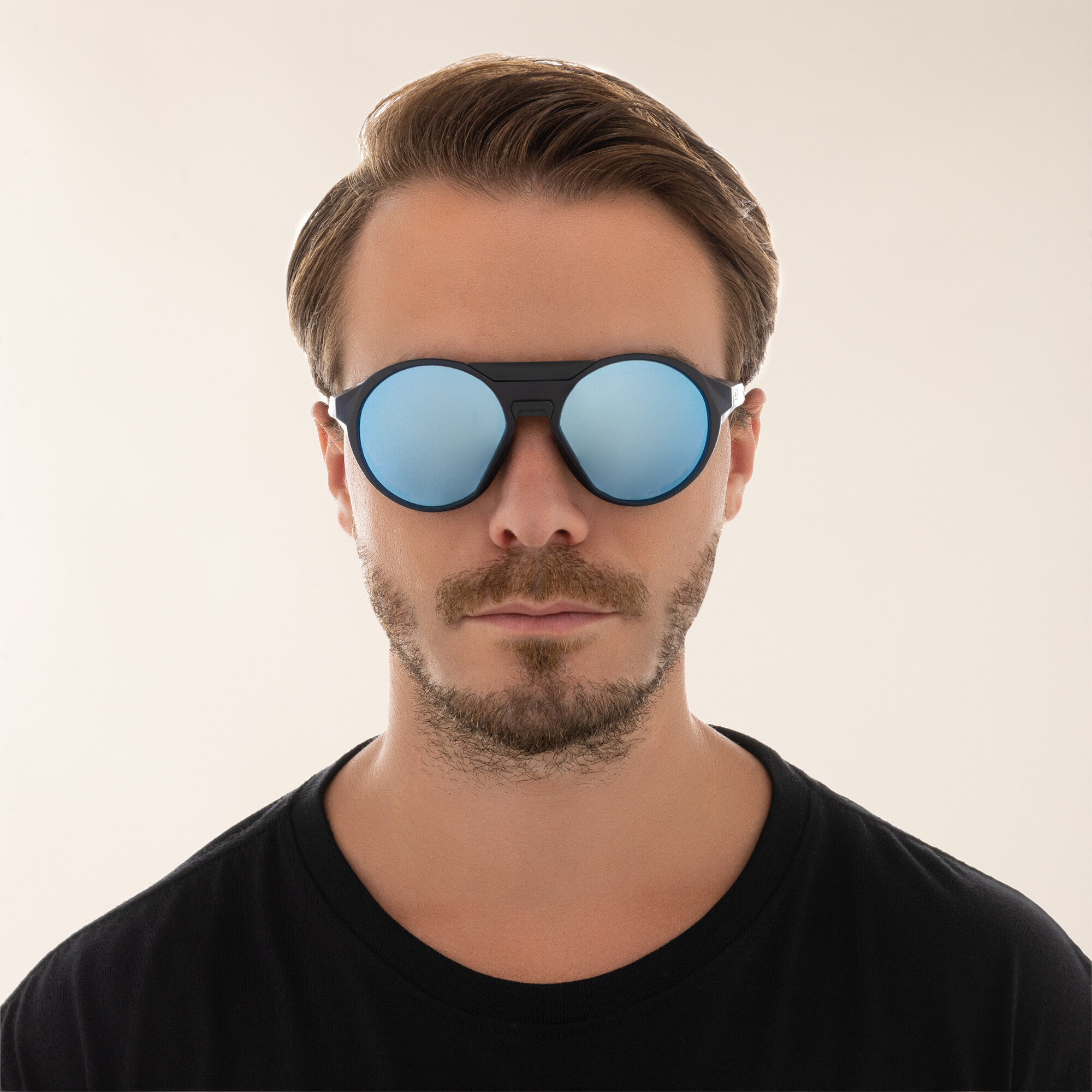 Shop Oakley Clifden Round Sunglasses in Matte Translucent Blue online.