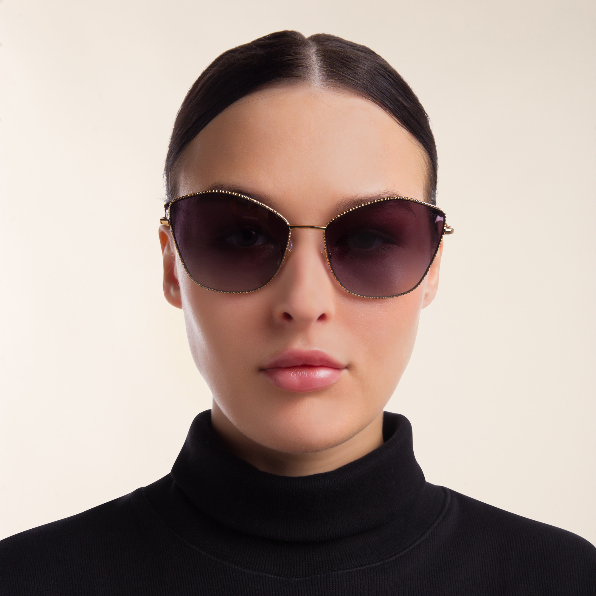 Shop MIU MIU Cat Eye Sunglasses in Antique Gold online.