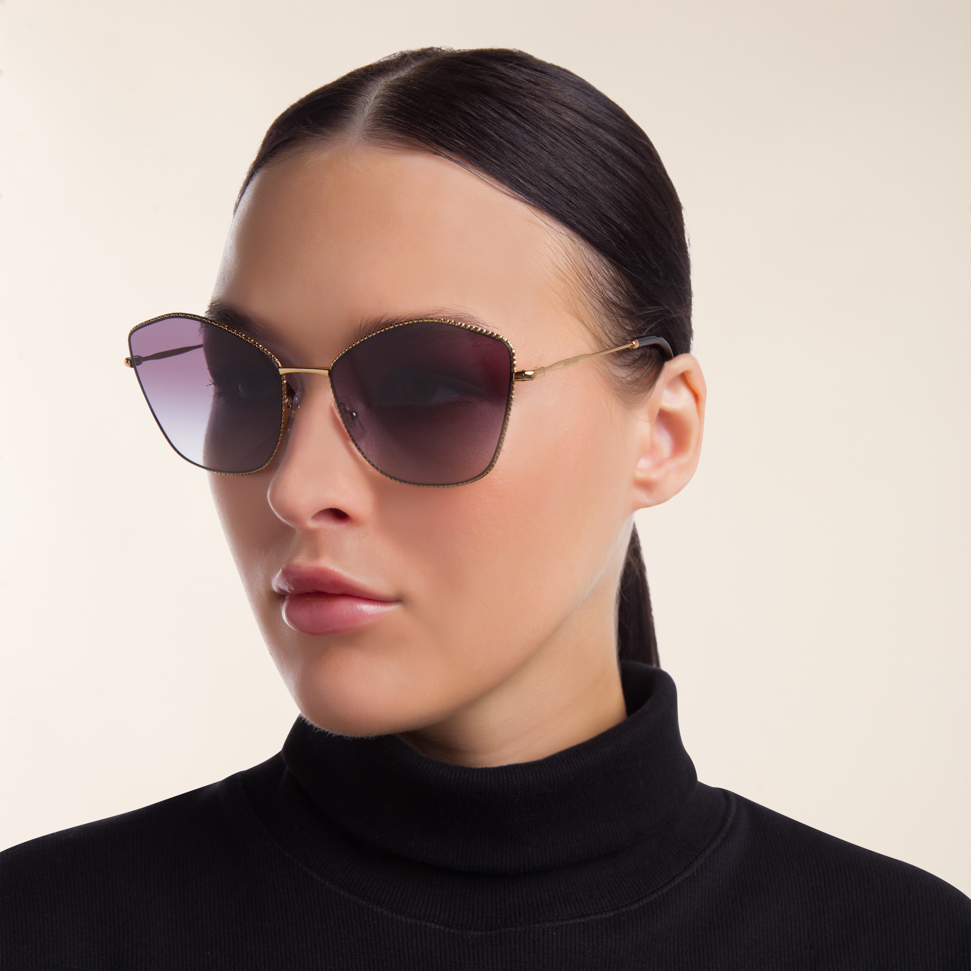 Shop MIU MIU Cat Eye Sunglasses in Antique Gold online.