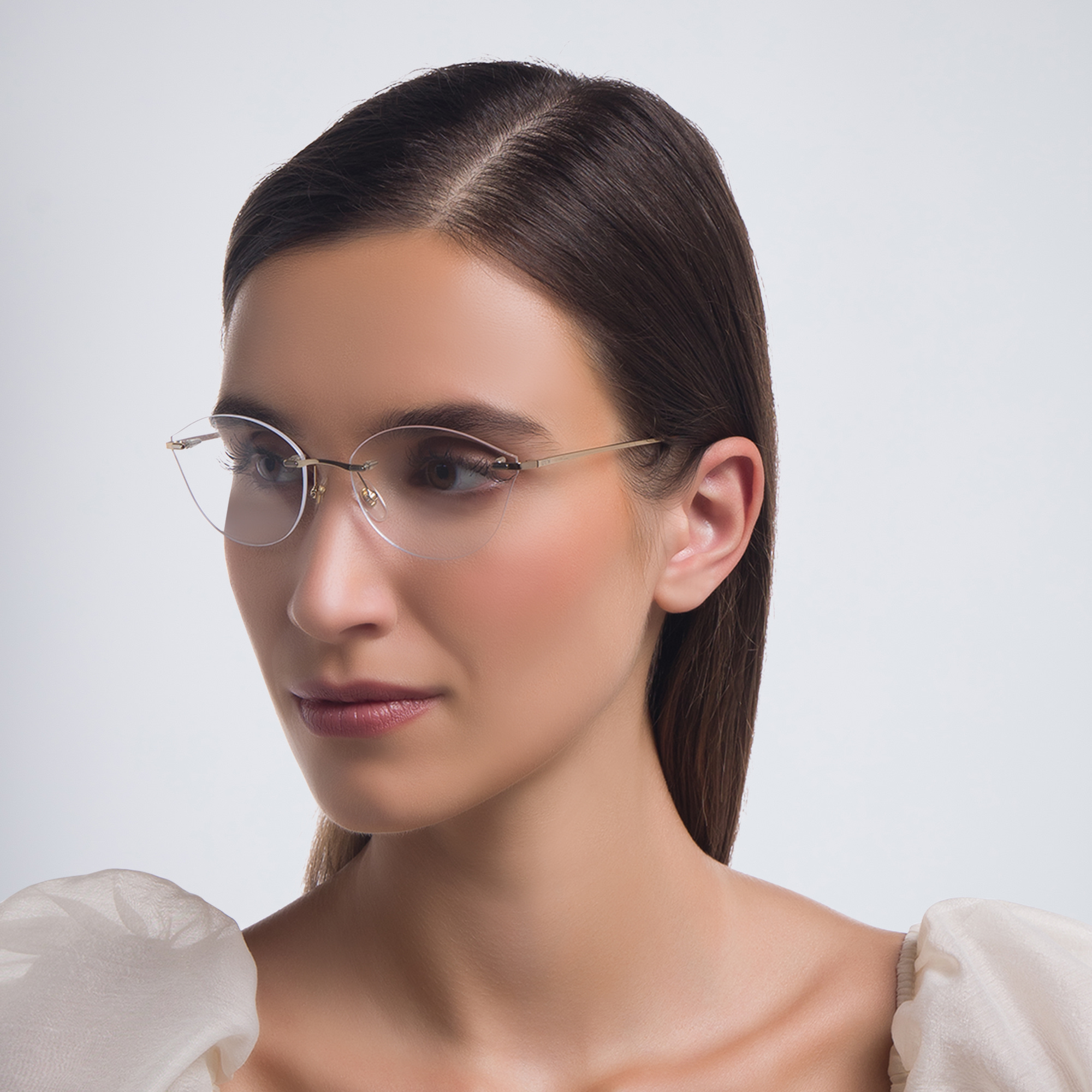 Shop EYE'M Rimless Wide Cat Eye Eyeglasses in Antique Gold online.