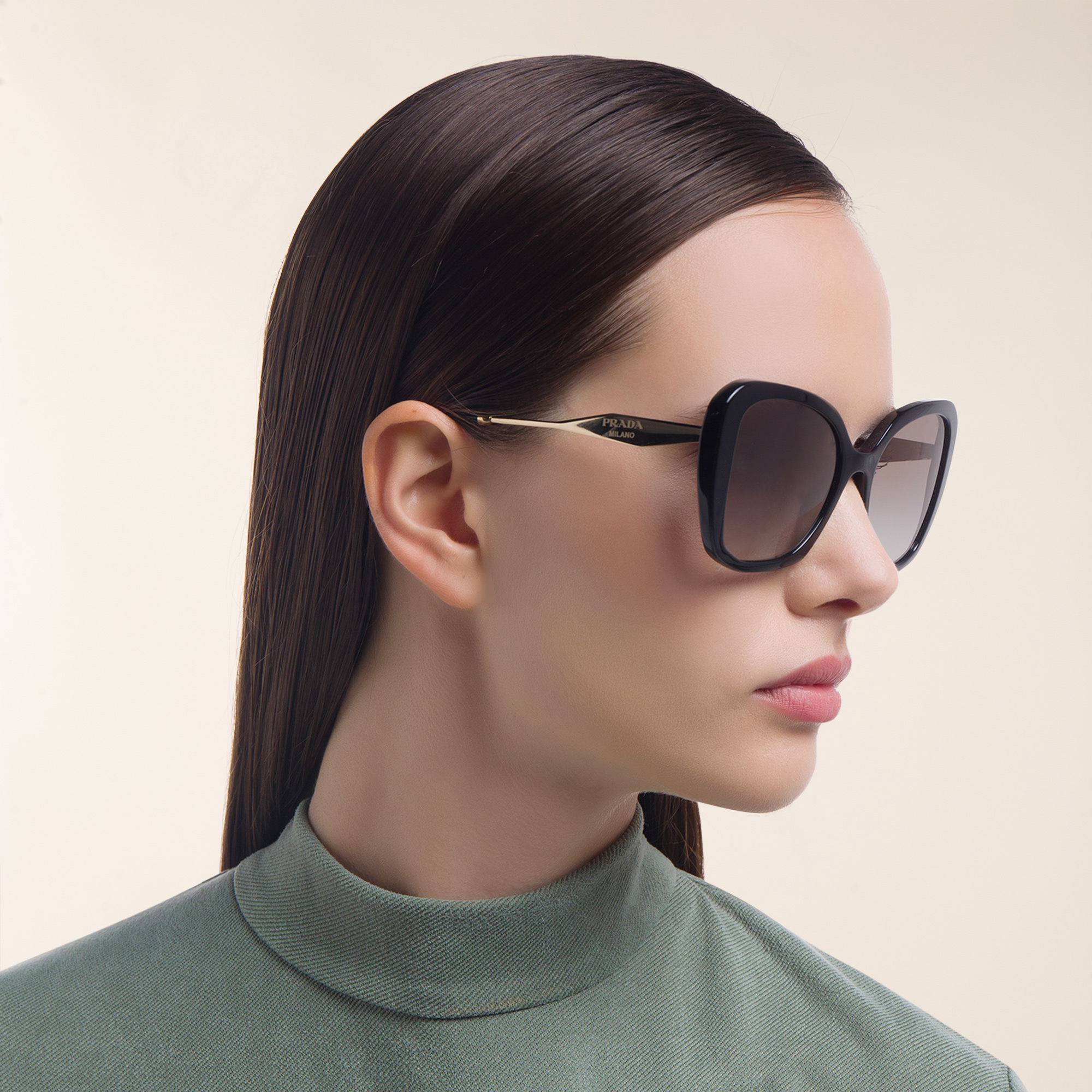 Shop PRADA Cat Eye Sunglasses in Black online.