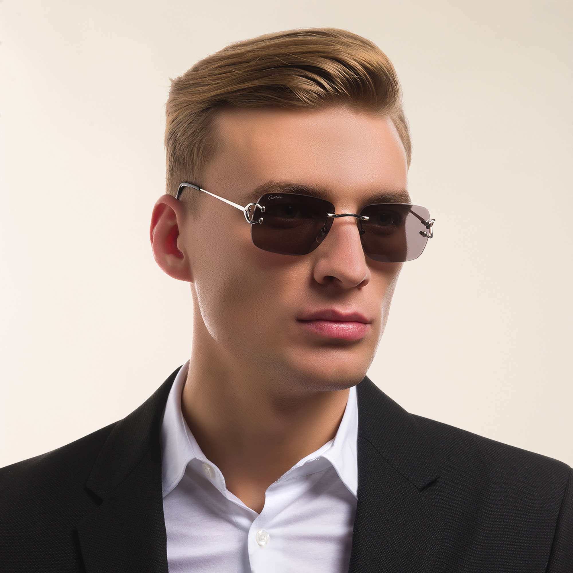 Shop Cartier Signature C de Cartier Rimless Rectangle Sunglasses in Silver online.