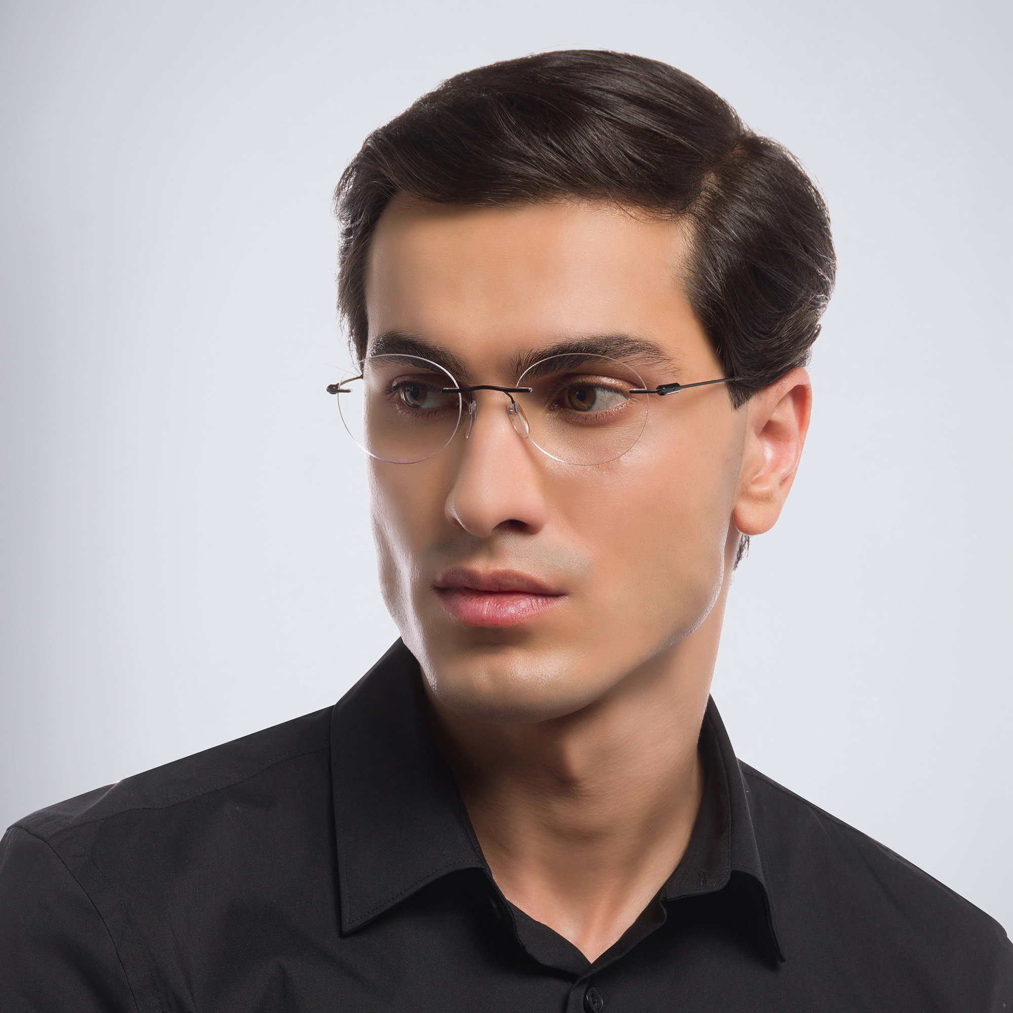 Shop Silhouette Rimless Round Eyeglasses in Black online.