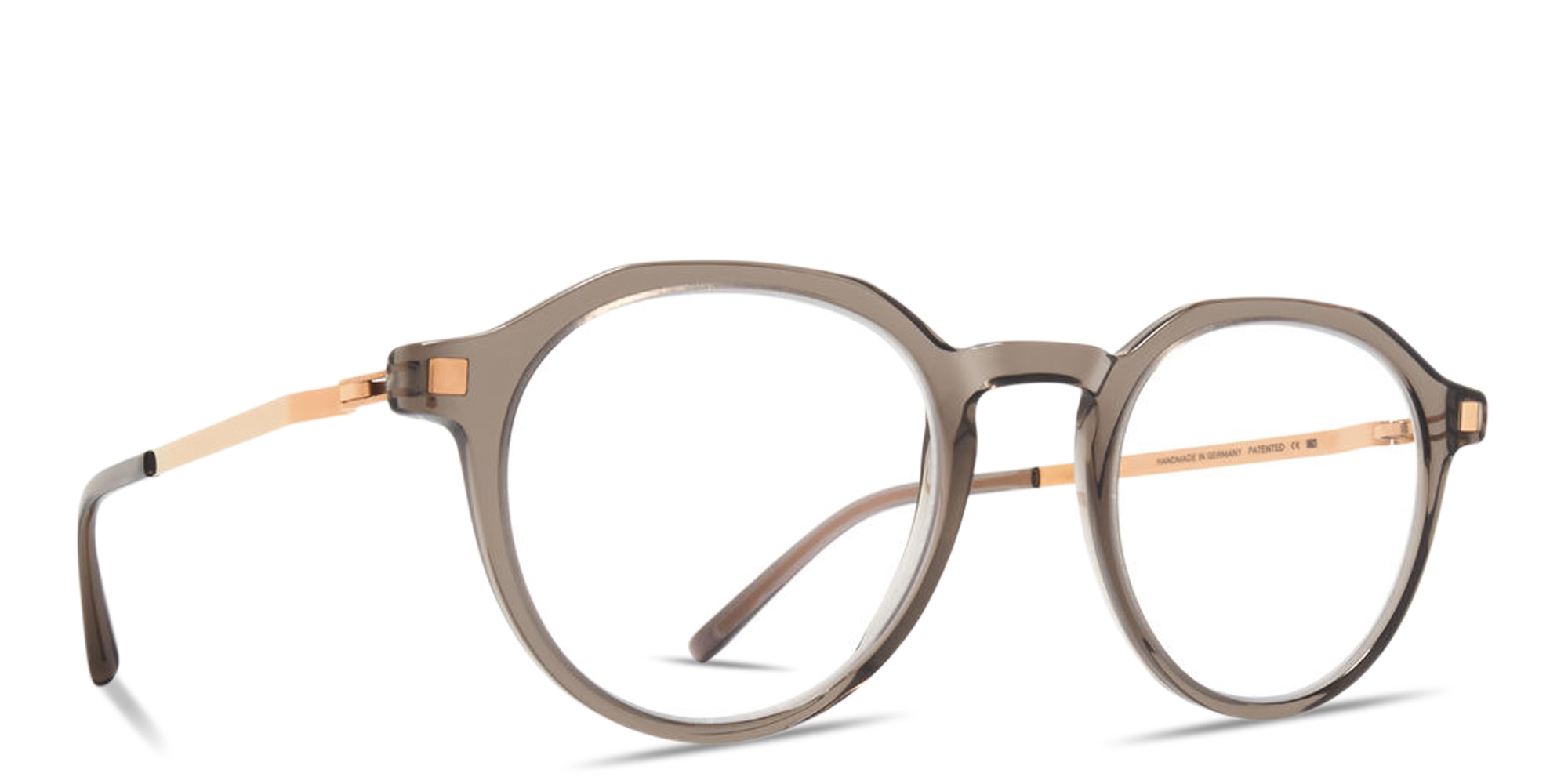 Shop MYKITA Saga Unisex Round Eyeglasses in Clear Ash online.