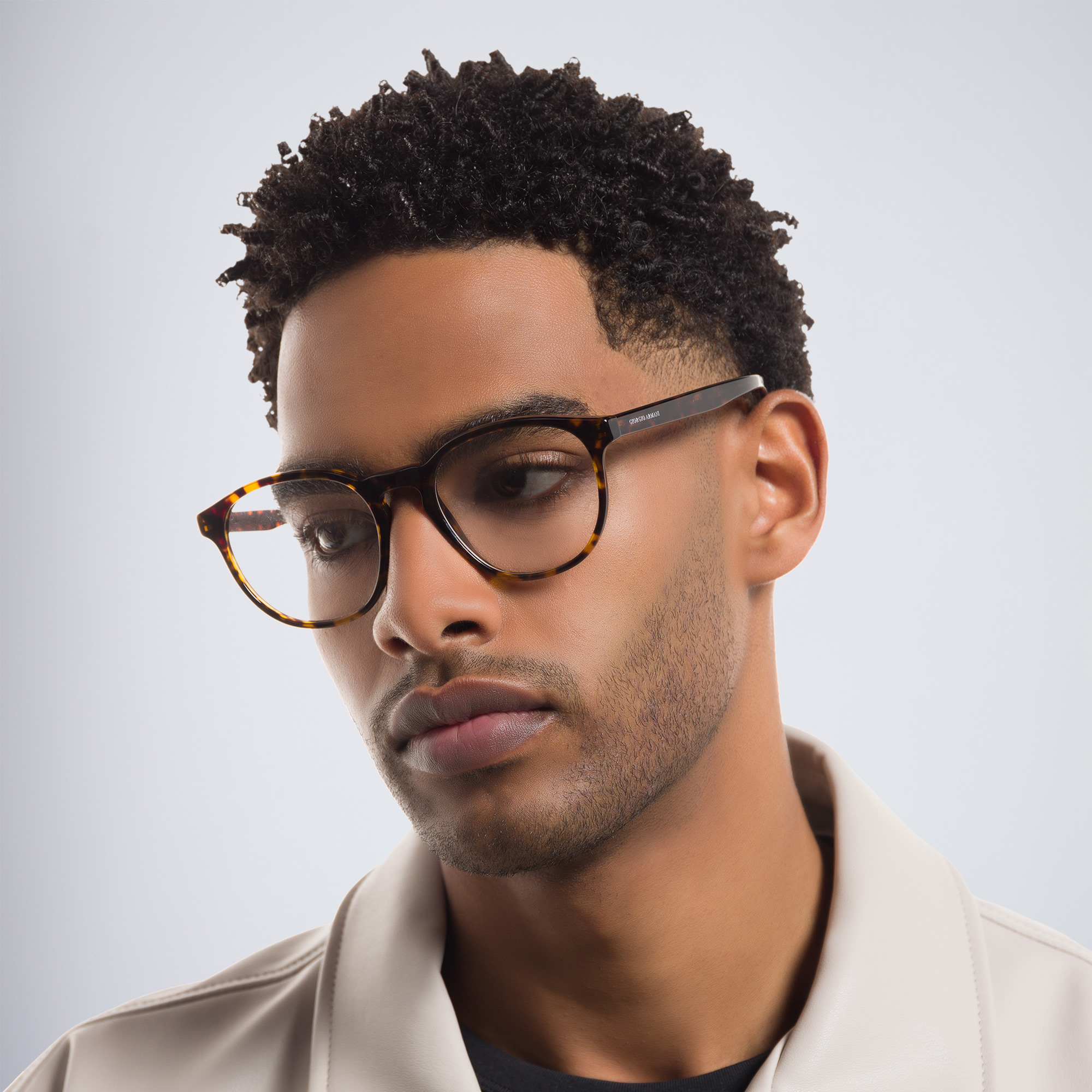 Shop GIORGIO ARMANI Round Eyeglasses in Shiny Havana online.