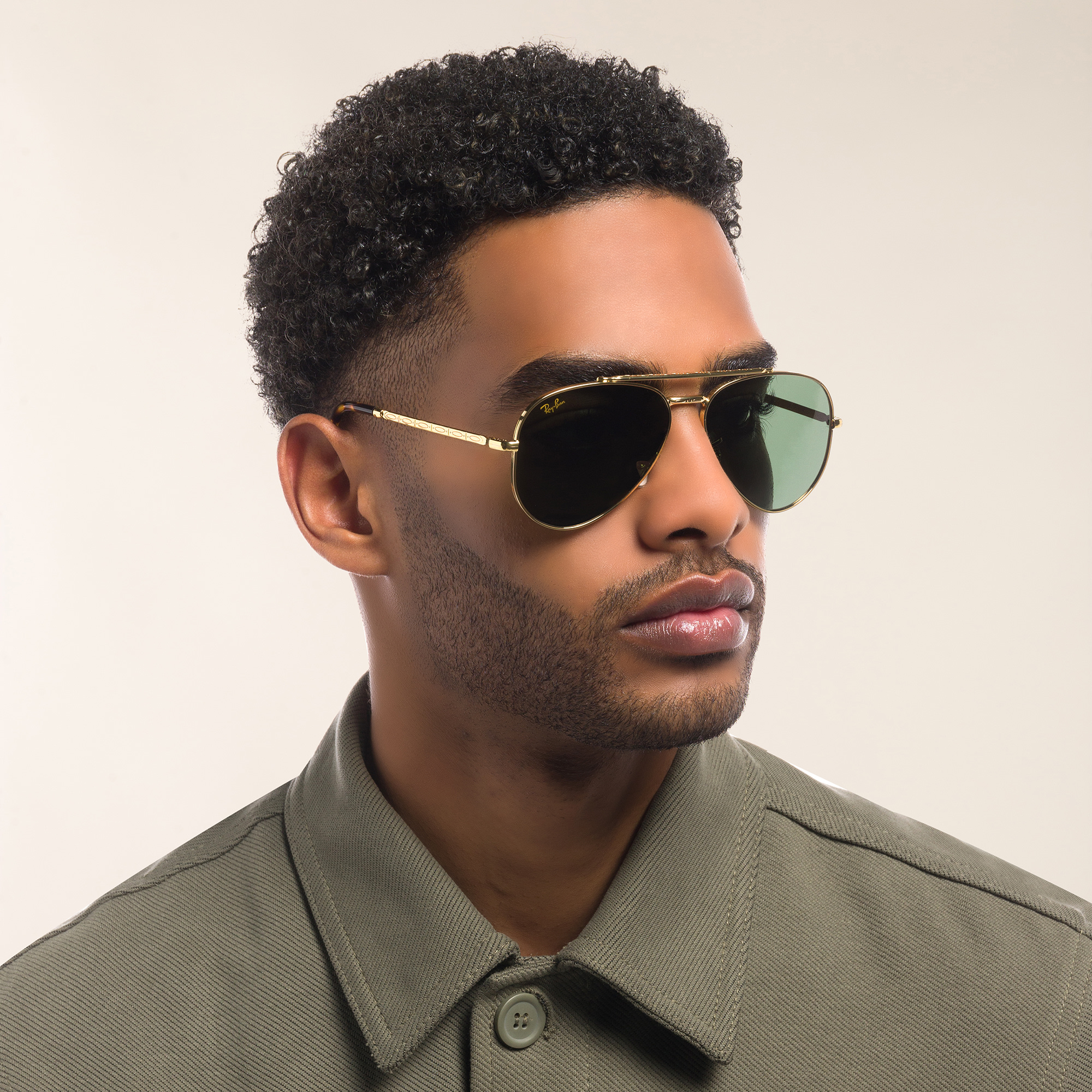 Shop Ray-Ban Unisex Wide Pilot Sunglasses in Gold online.