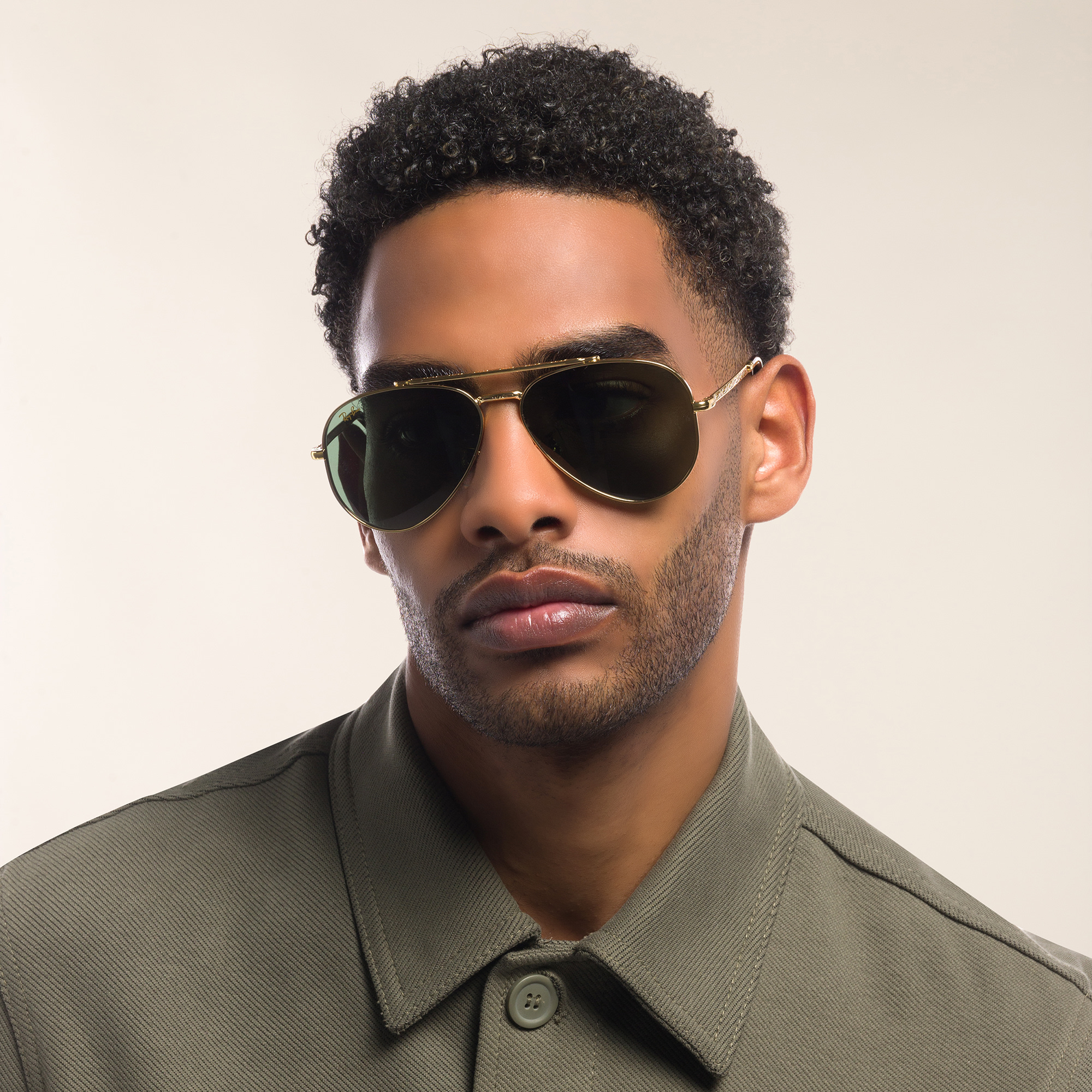 Shop Ray-Ban Unisex Wide Pilot Sunglasses in Gold online.