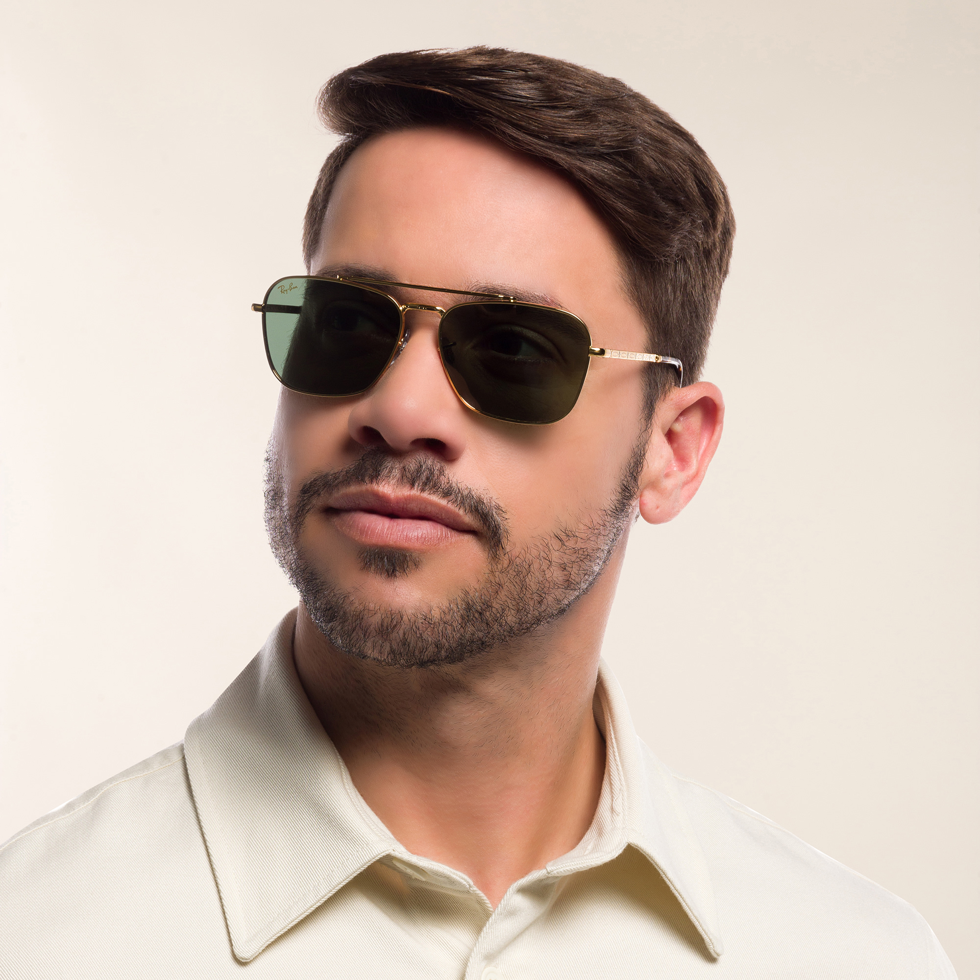 Shop Ray-Ban New Caravan Unisex Square Sunglasses in Gold online.