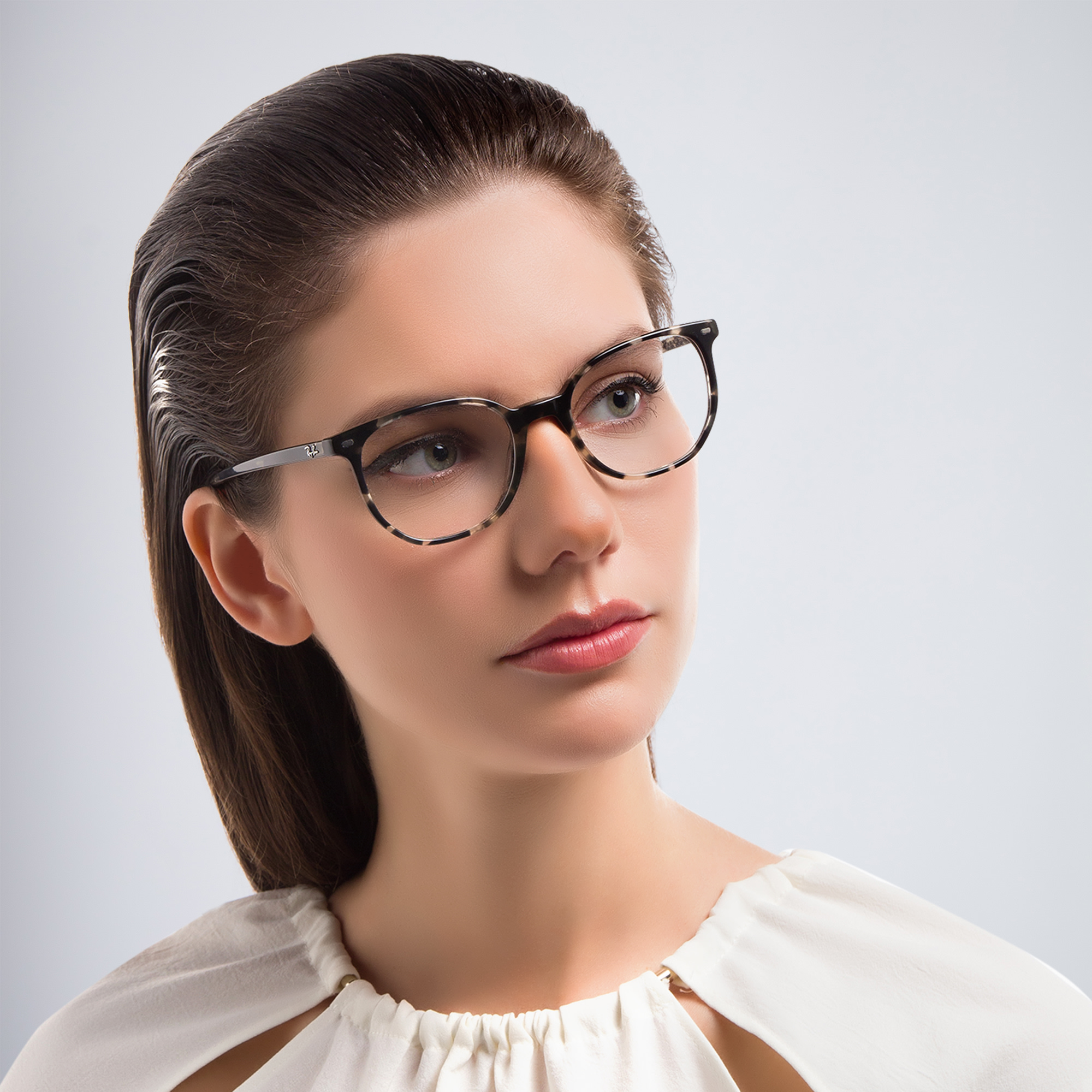 Shop Ray-Ban Elliot Unisex Irregular Eyeglasses in Grey Havana online.