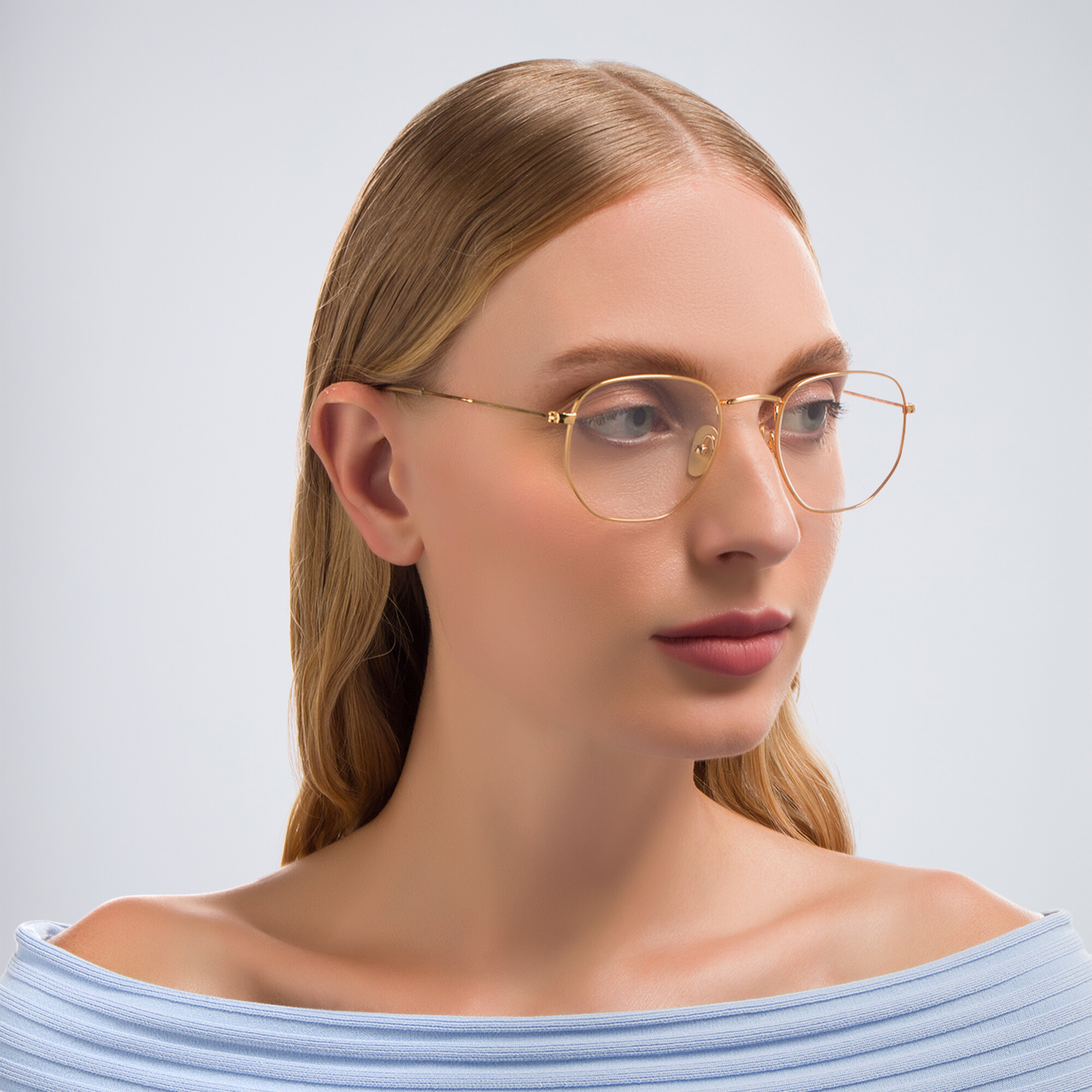 Shop Ray-Ban Hexagonal Unisex Eyeglasses in Polished Gold online.