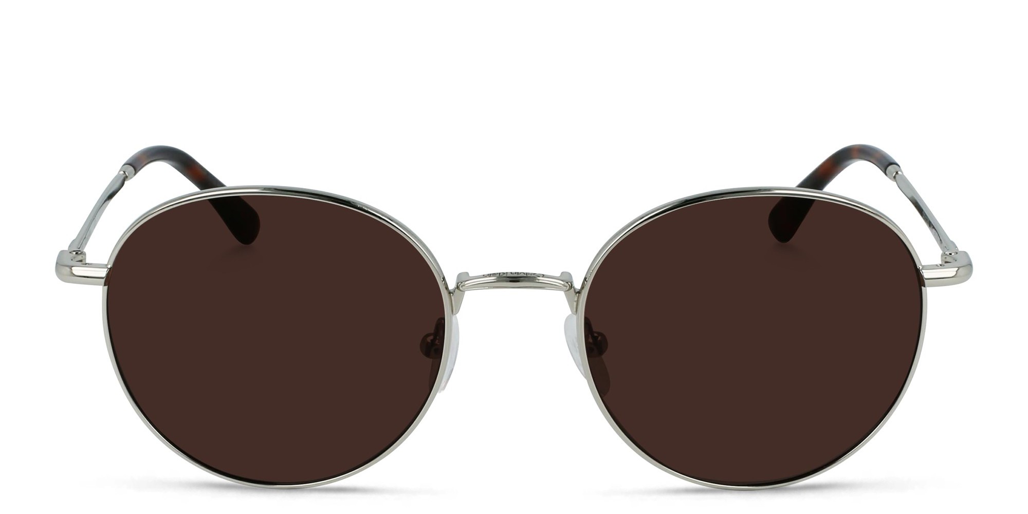 Shop Calvin Klein Round Sunglasses in Silver online.