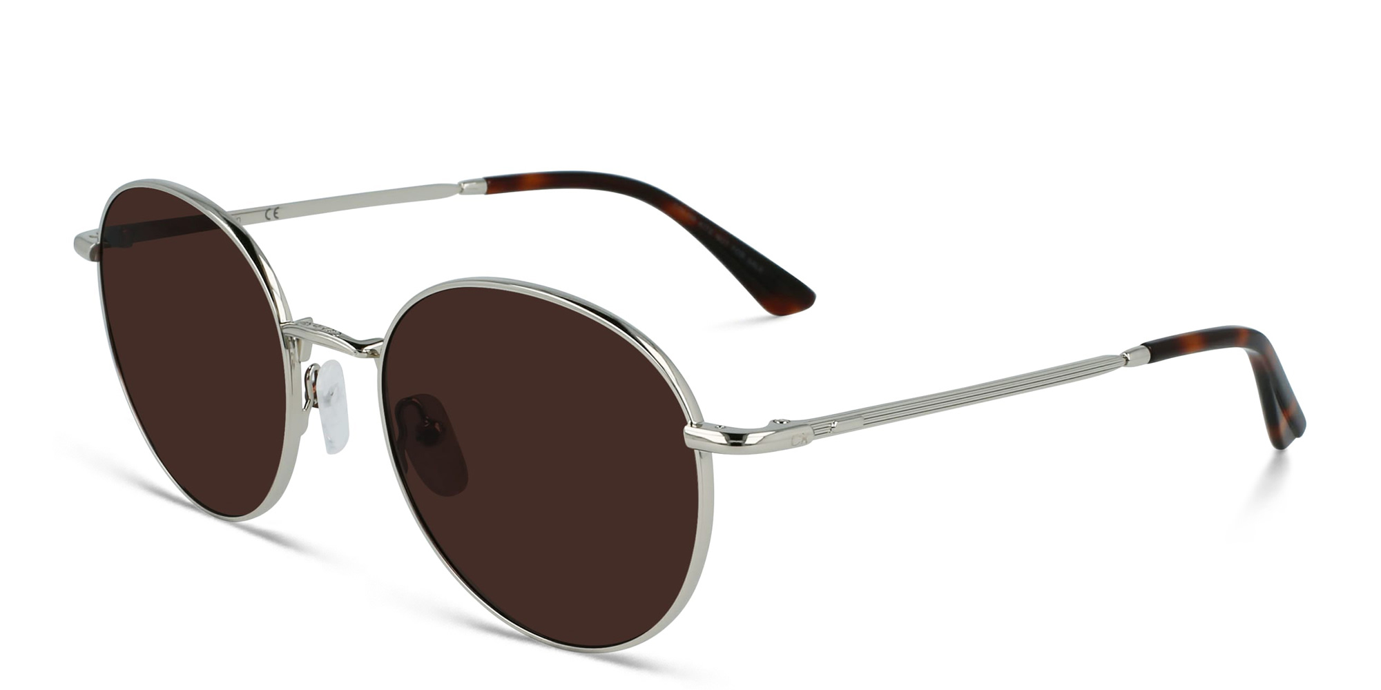Shop Calvin Klein Round Sunglasses in Silver online.