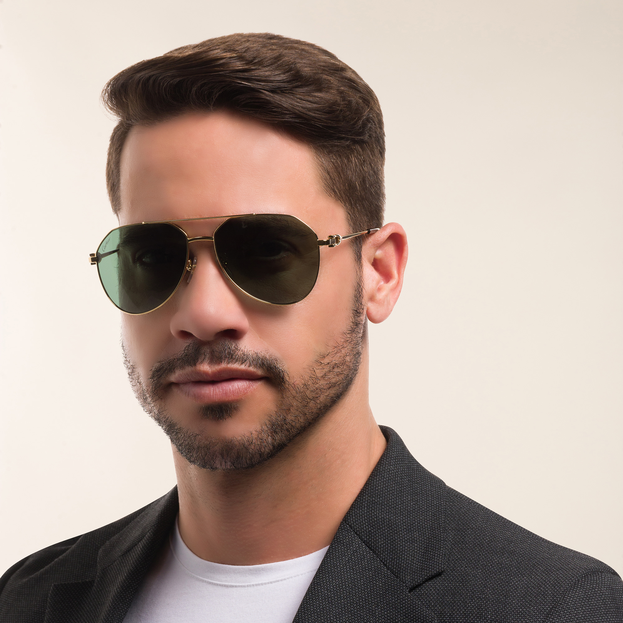 Shop Cartier Signature C de Cartier Pilot Sunglasses in Gold online.