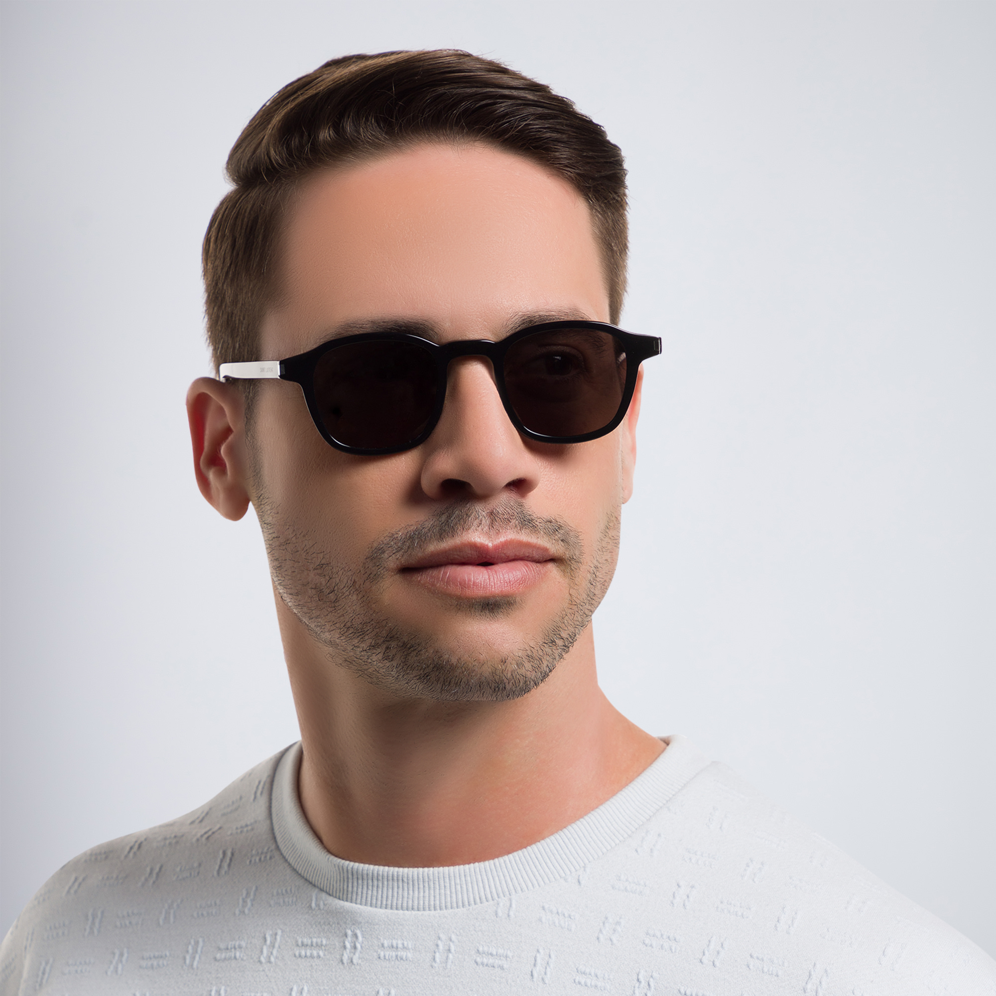 Shop SAINT LAURENT Round Sunglasses in Black online.