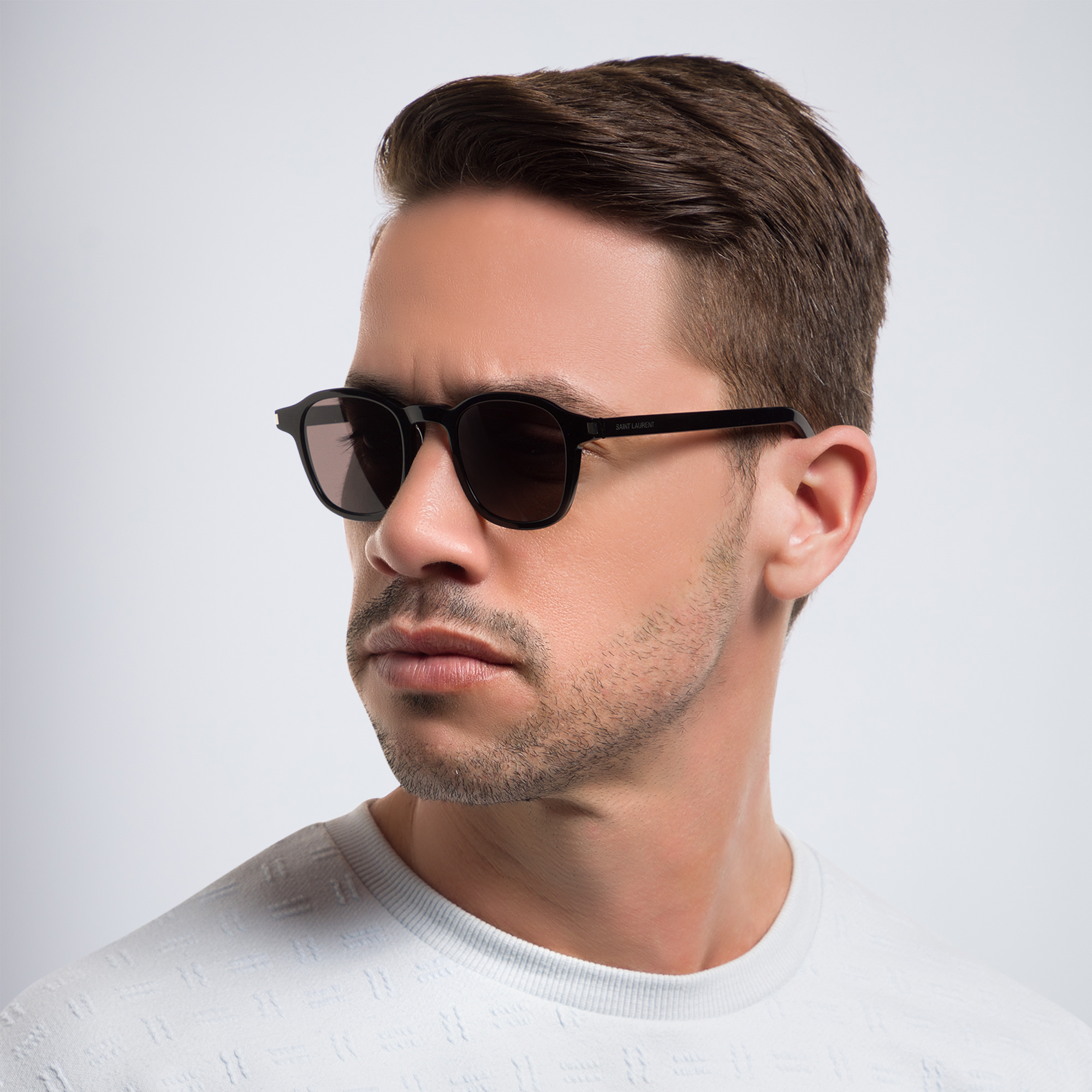 Shop SAINT LAURENT Round Sunglasses in Black online.