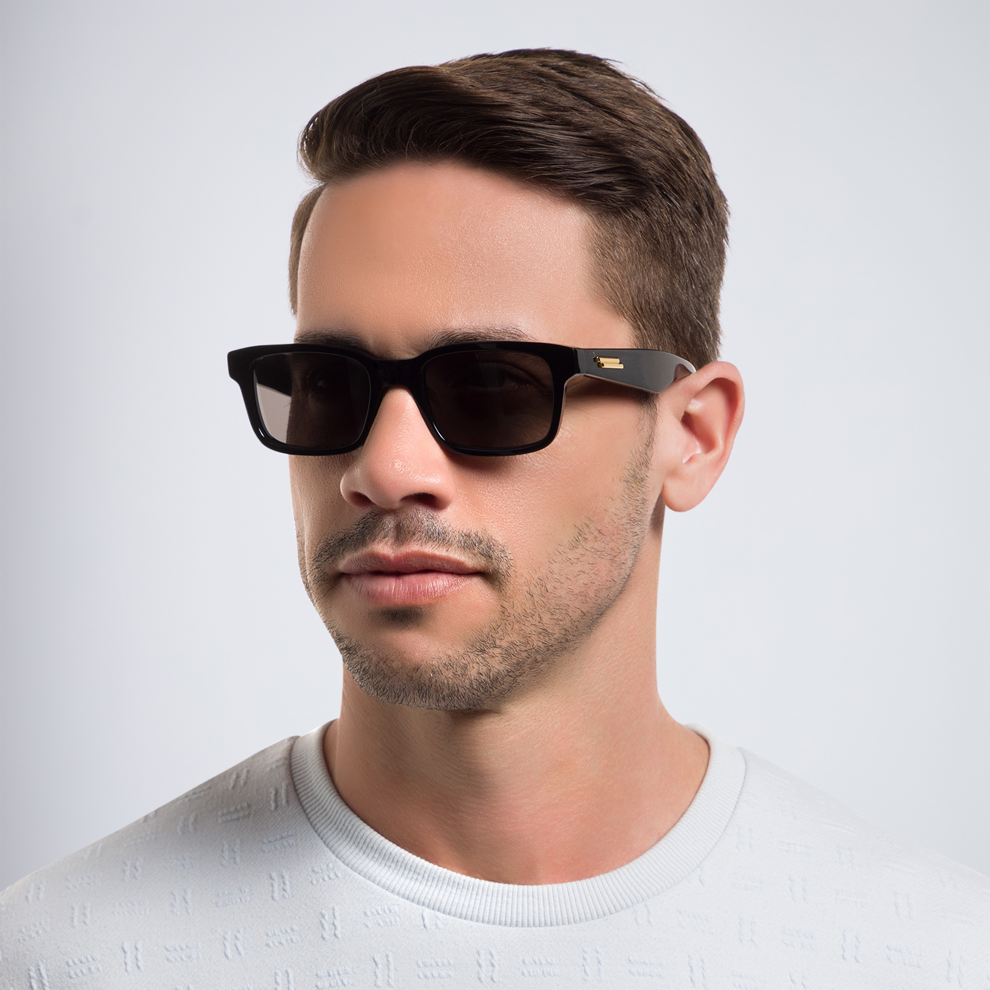 Shop BOTTEGA VENETA Rectangle Sunglasses in Black online.