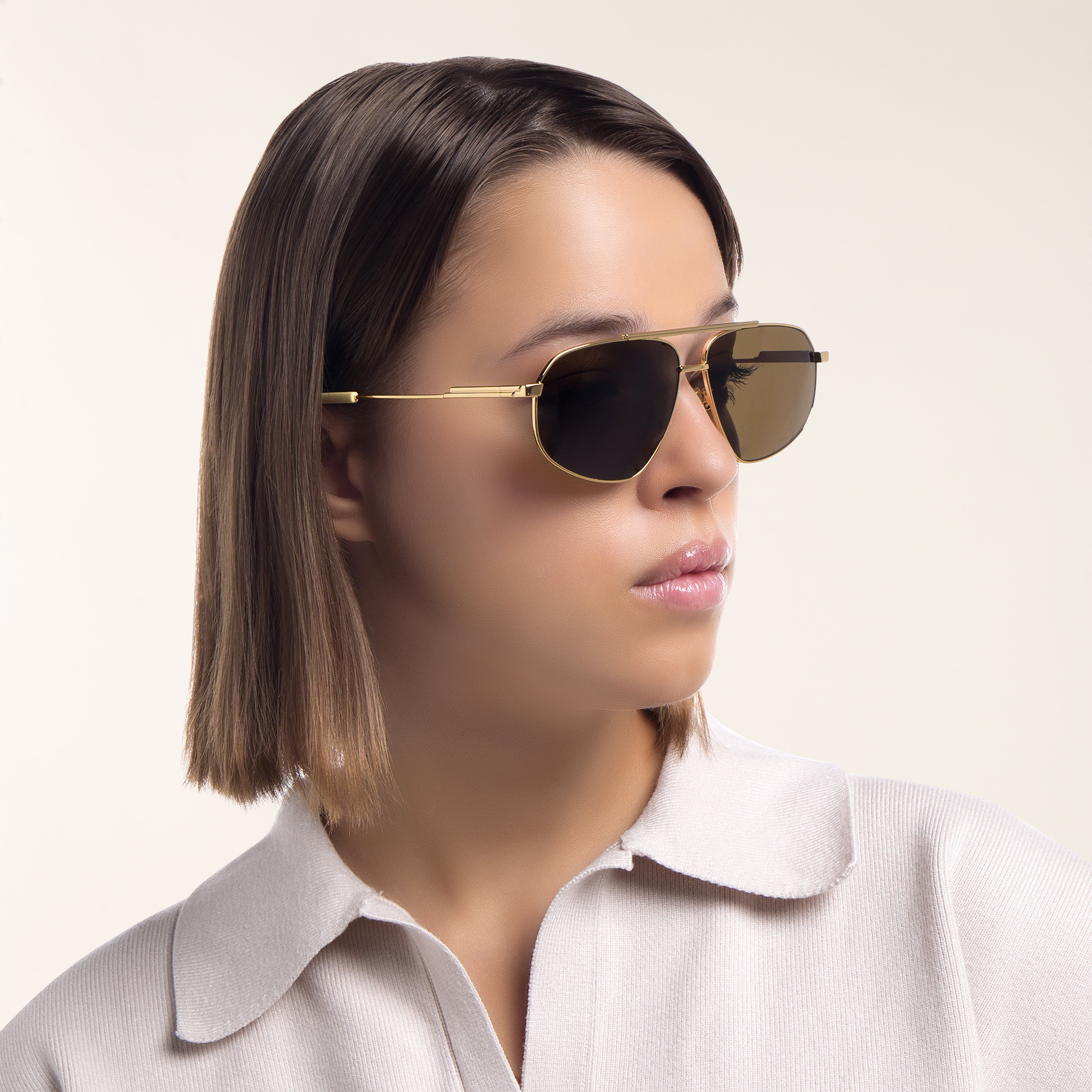 Shop BOTTEGA VENETA Unisex Aviator Sunglasses in Gold online.