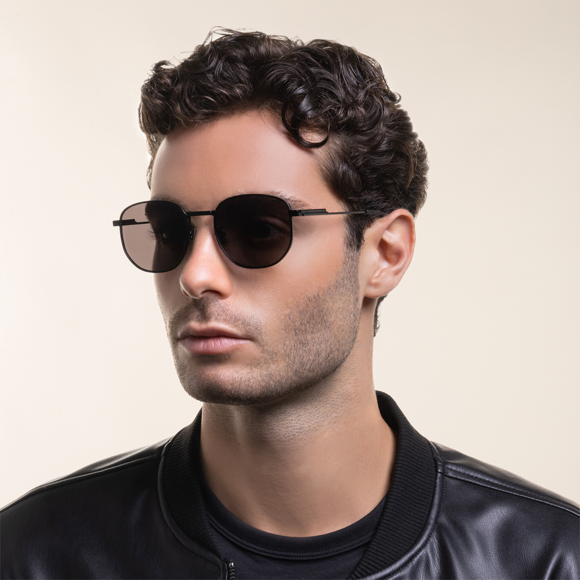 Shop BOTTEGA VENETA Unisex Round Sunglasses in Black online.