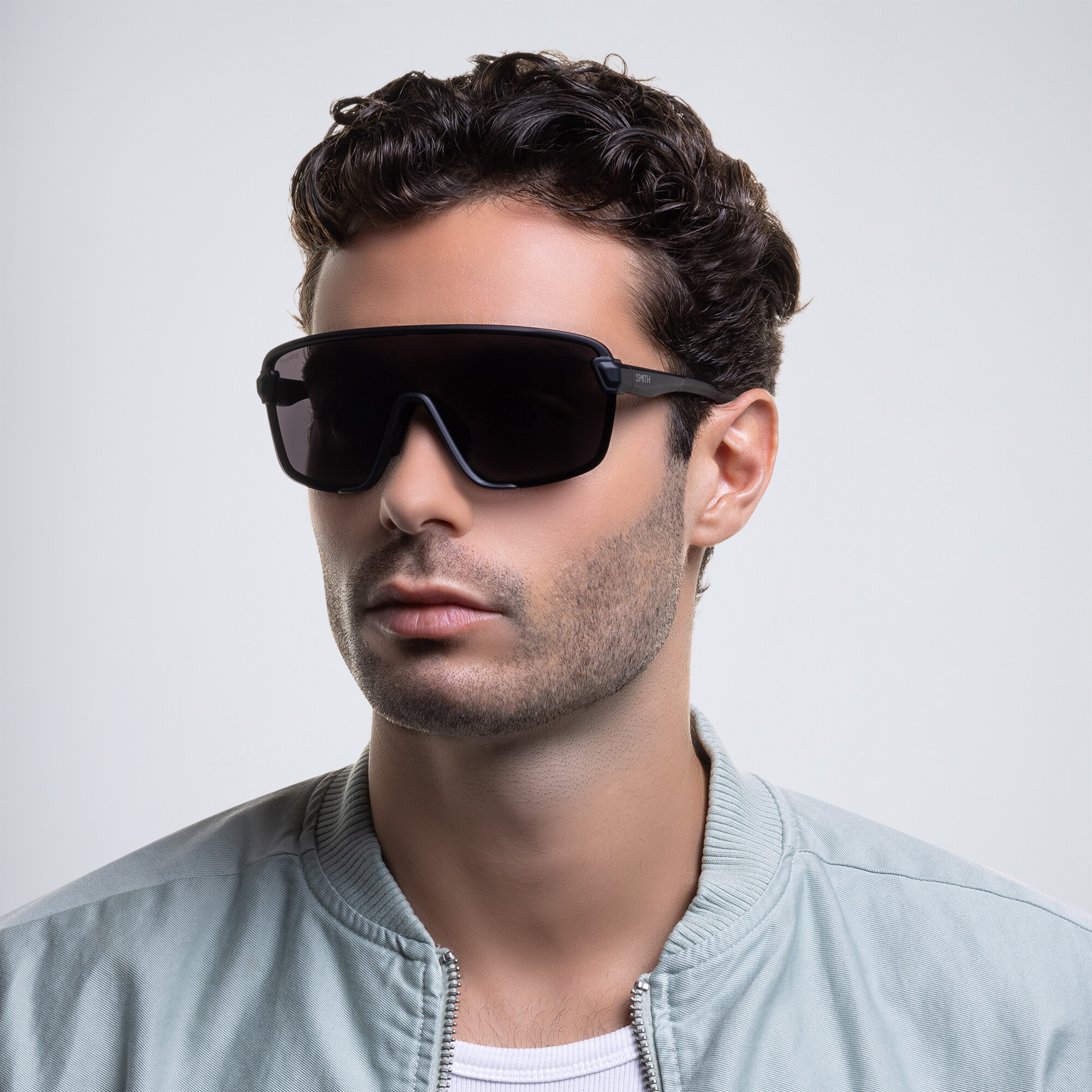 Shop SMITH Unisex Wide Irregular Sunglasses in Black online.