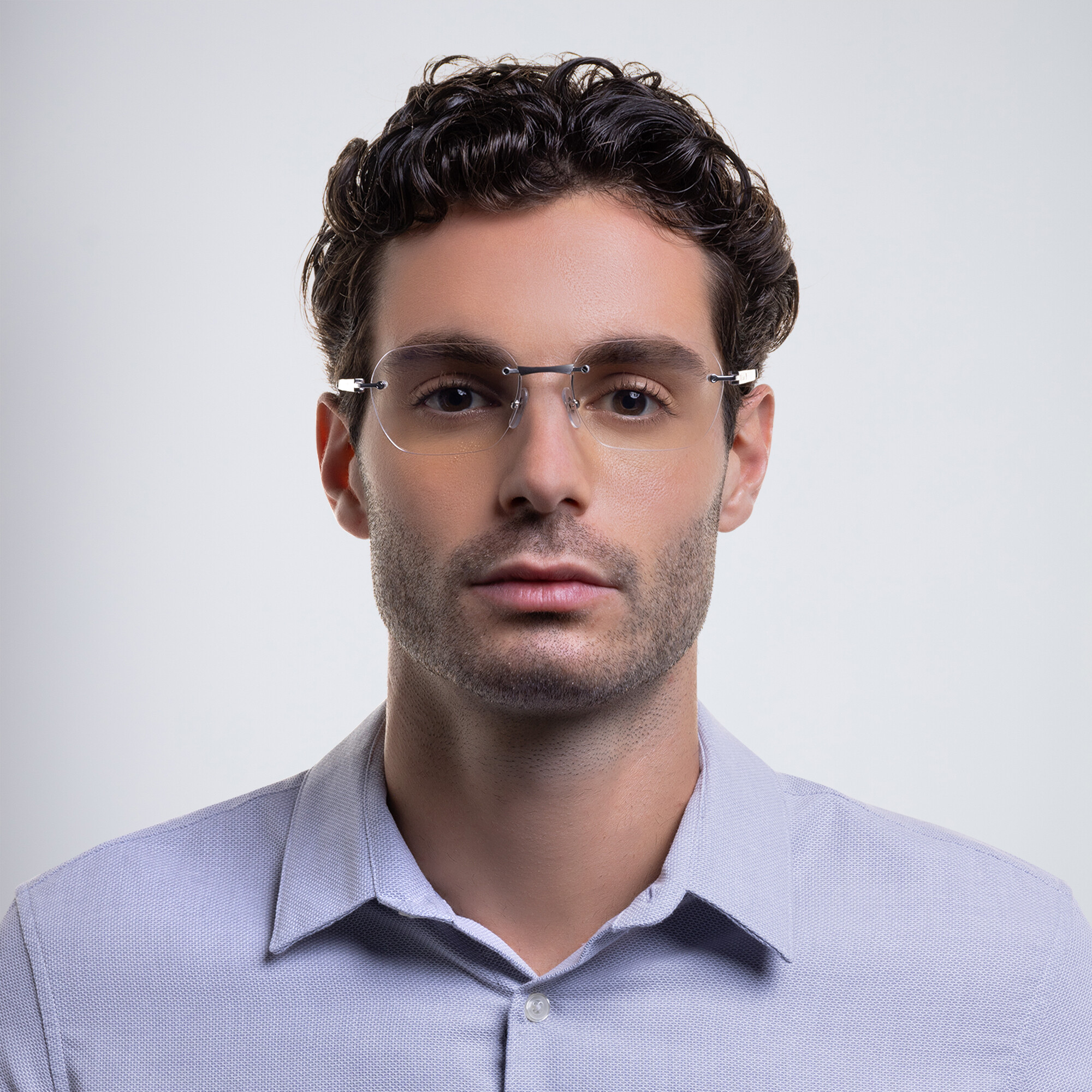 Shop Cartier Santos de Cartier Wide Rectangle Eyeglasses in Silver online.