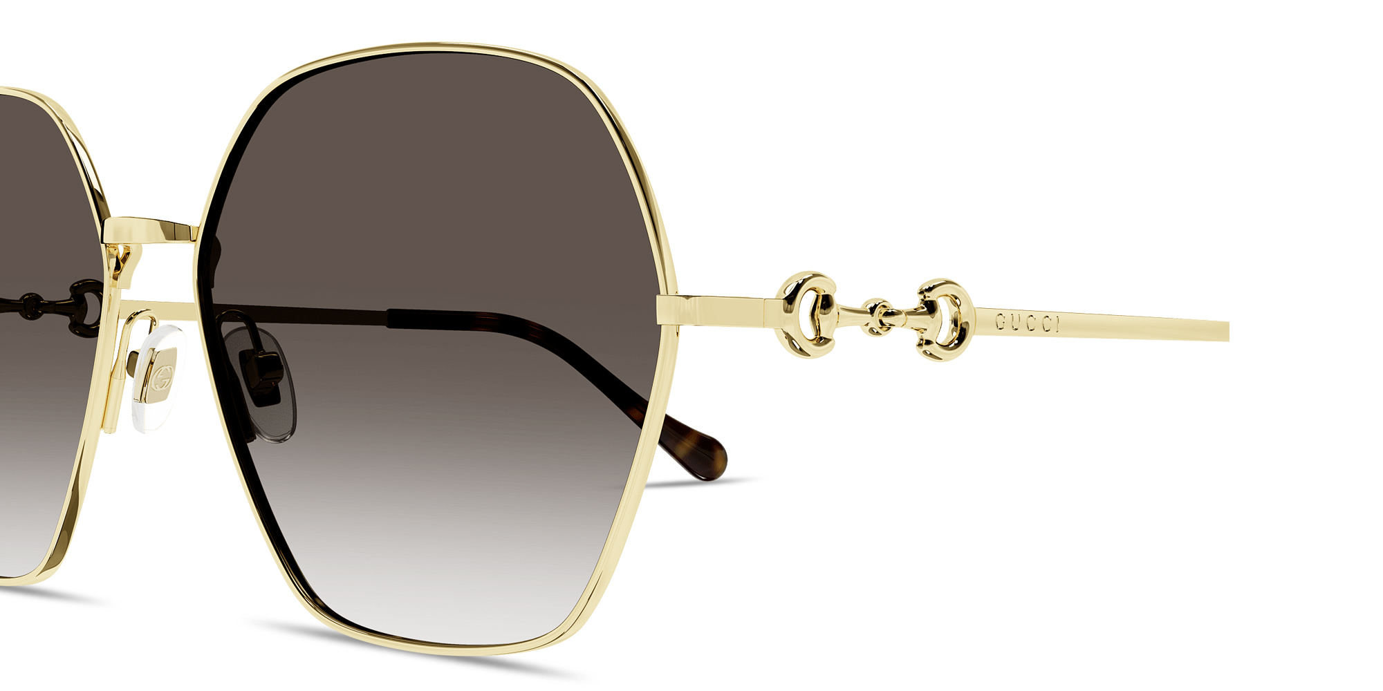 Shop GUCCI Horsebit Oversized Irregular Sunglasses in Gold online.