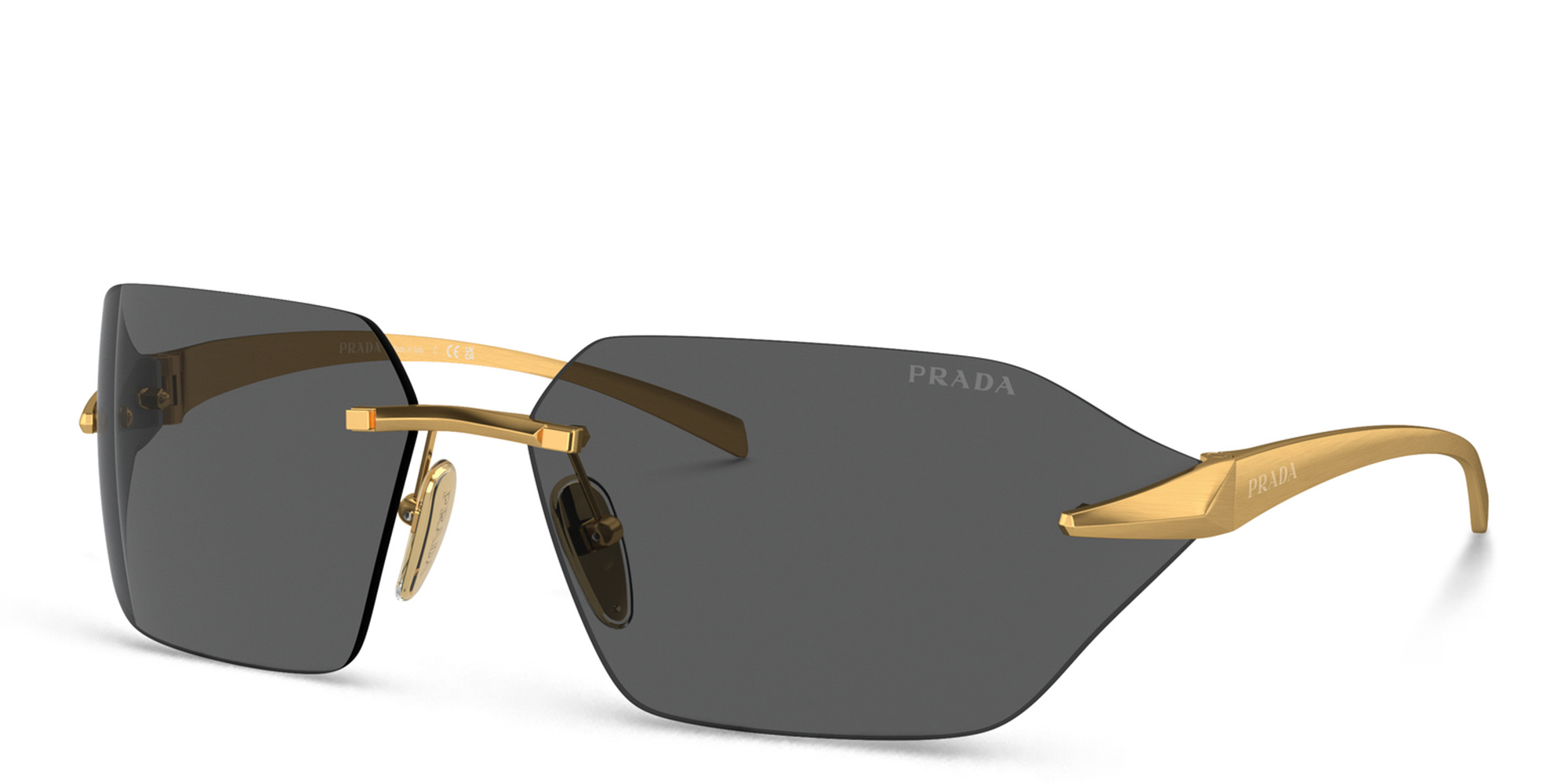 Shop PRADA Rimless Wide Irregular Sunglasses in Satin Yellow Gold online.