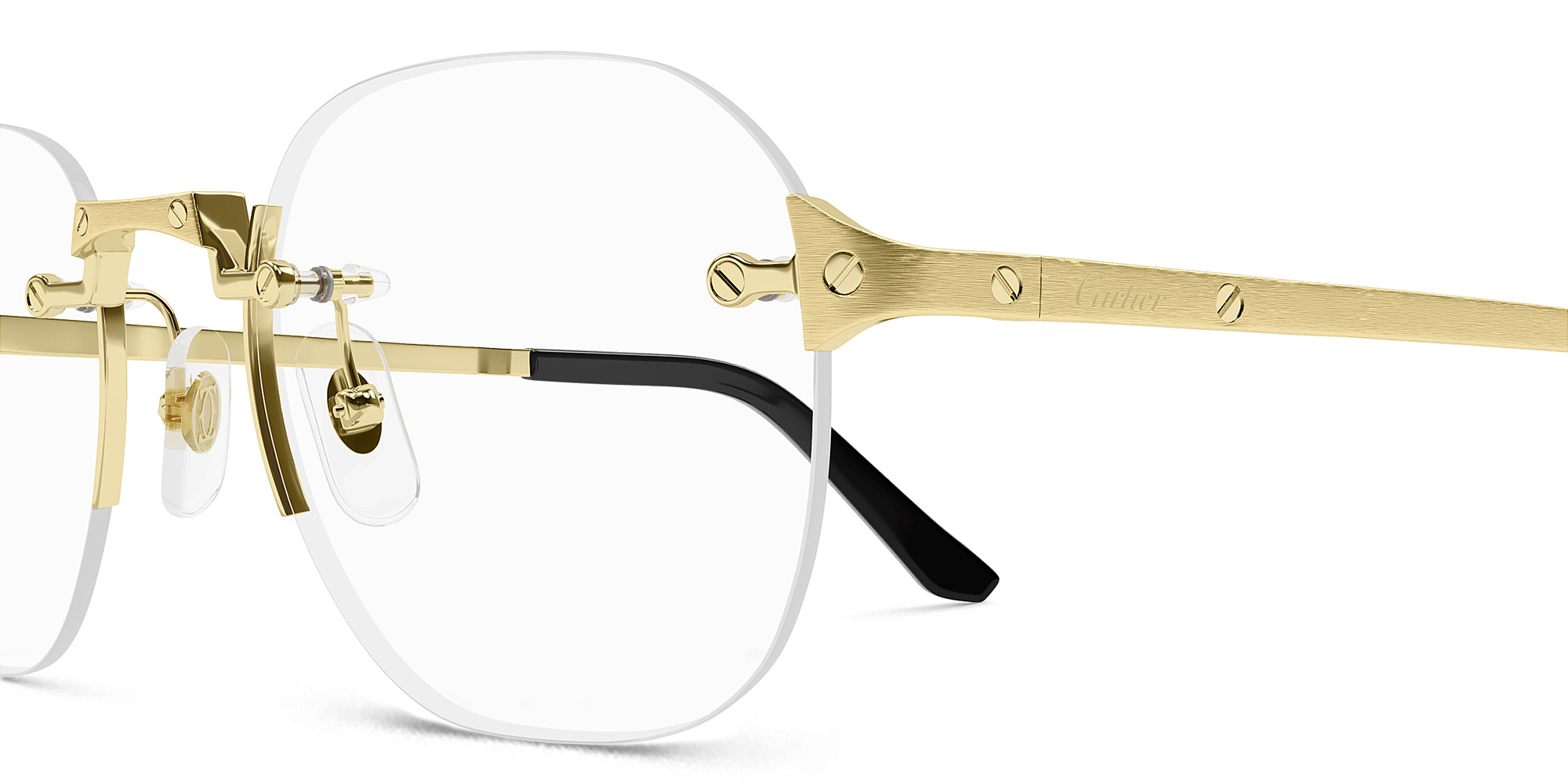 Shop Cartier Santos de Cartier Rimless Round Eyeglasses in Gold online.