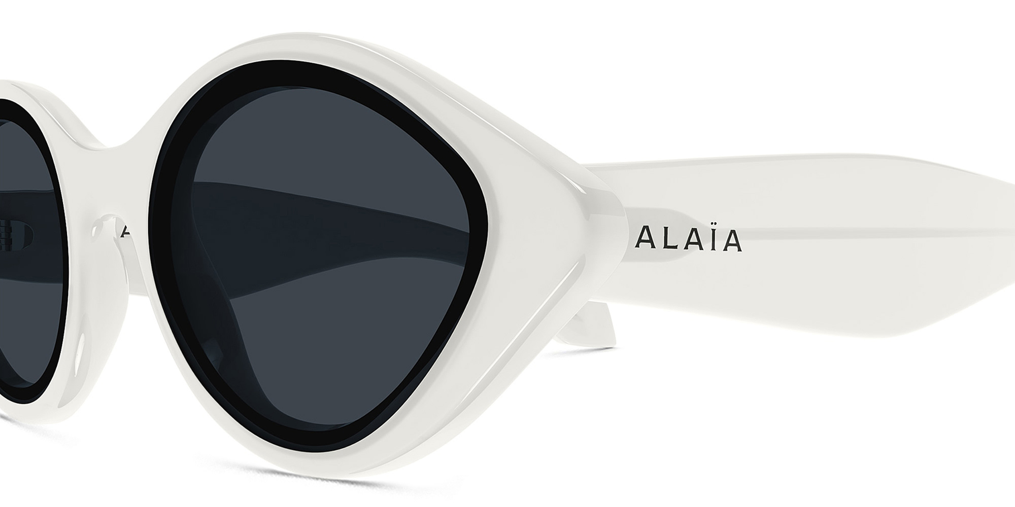 ALAIA Logo Round Sunglasses in White – Product Photo 3