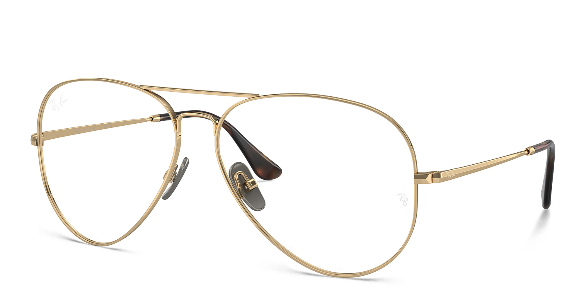 Shop Ray-Ban Pilot Titanium Optics Wide Unisex Eyeglasses in Light Brown online.