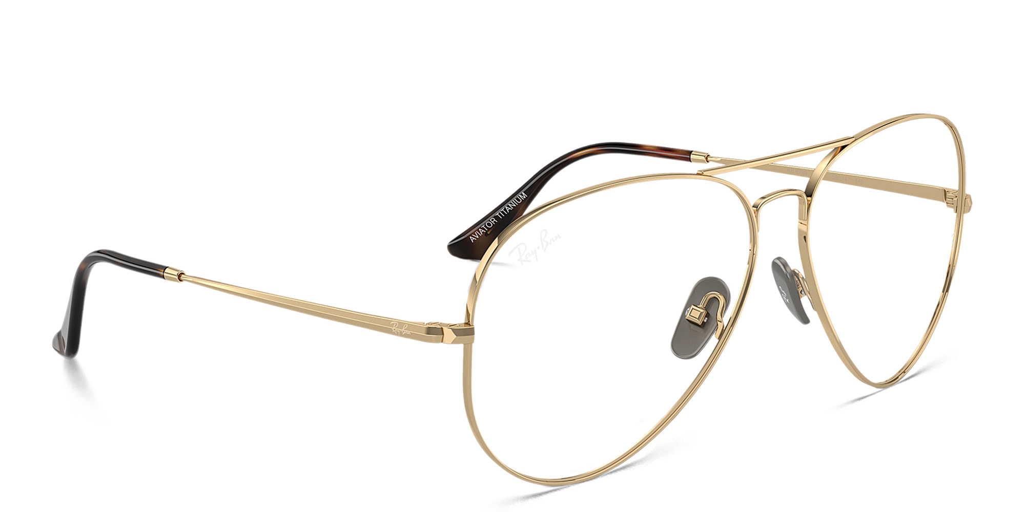 Shop Ray-Ban Pilot Titanium Optics Wide Unisex Eyeglasses in Light Brown online.